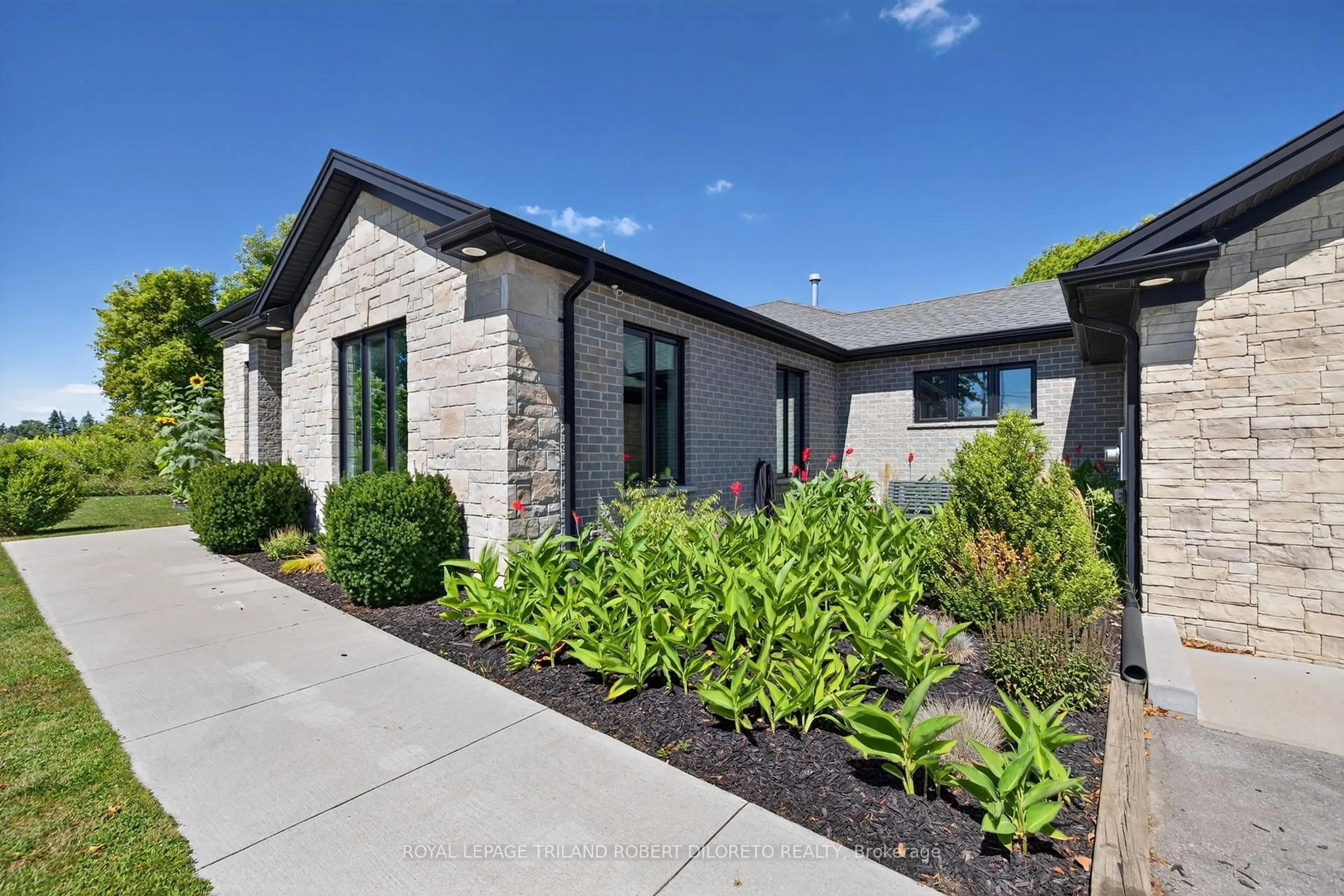Home with brick exterior material, street for 1445 Sunningdale Rd, London North Ontario N6G 5B7