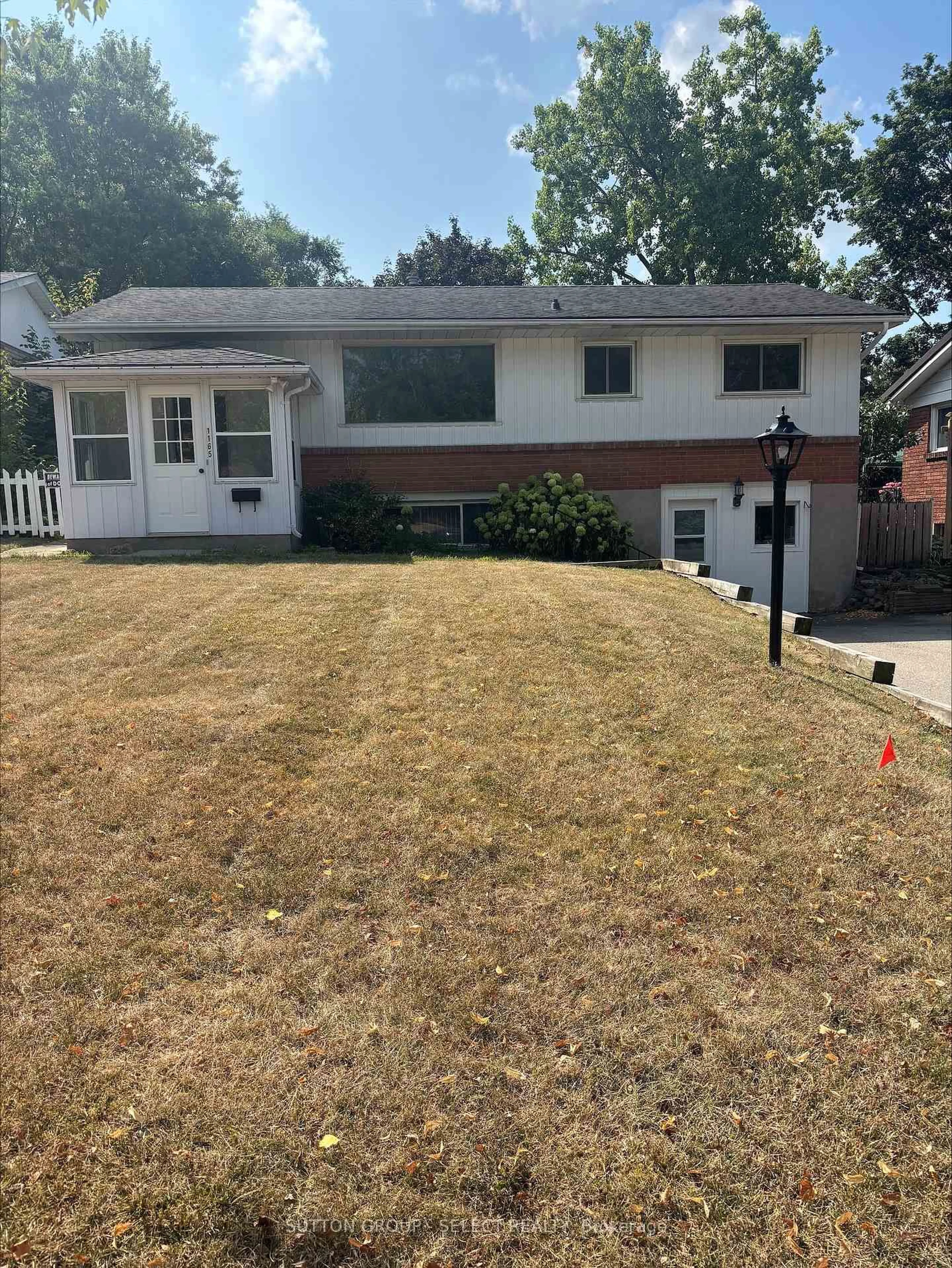 Home with vinyl exterior material, street for 1165 Melsandra Ave, London East Ontario N5Y 4N8