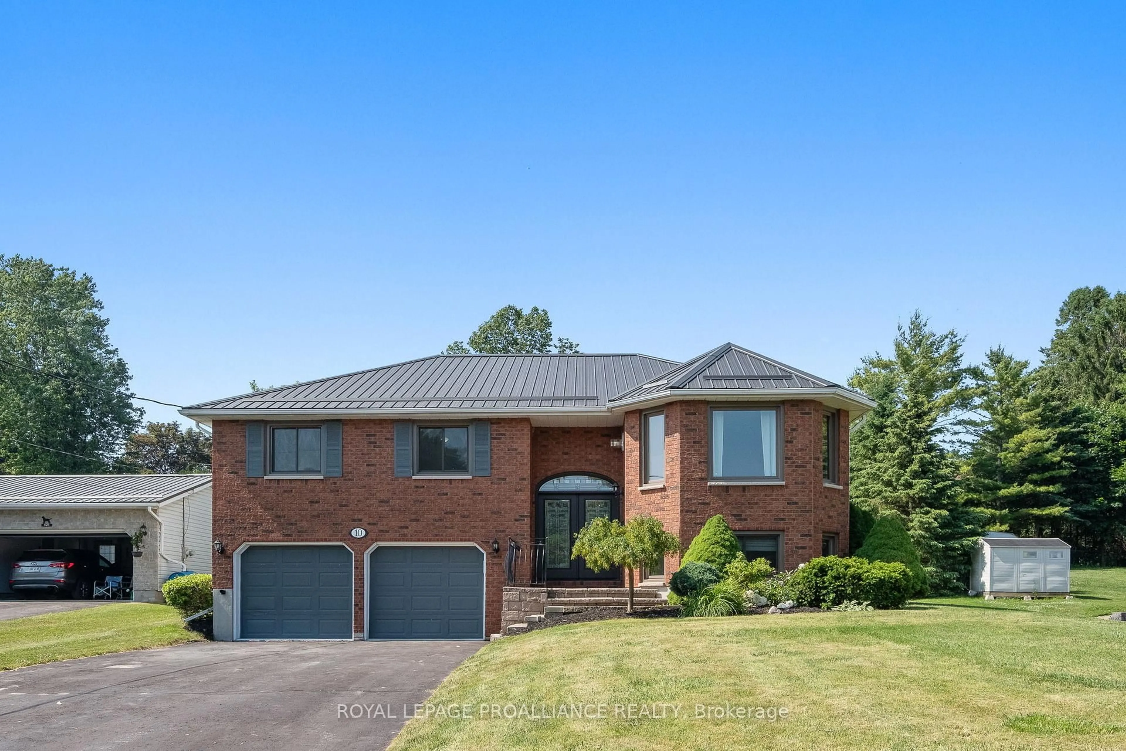 Home with brick exterior material, street for 10 Lenore Ave, Hamilton Township Ontario K9A 5M2