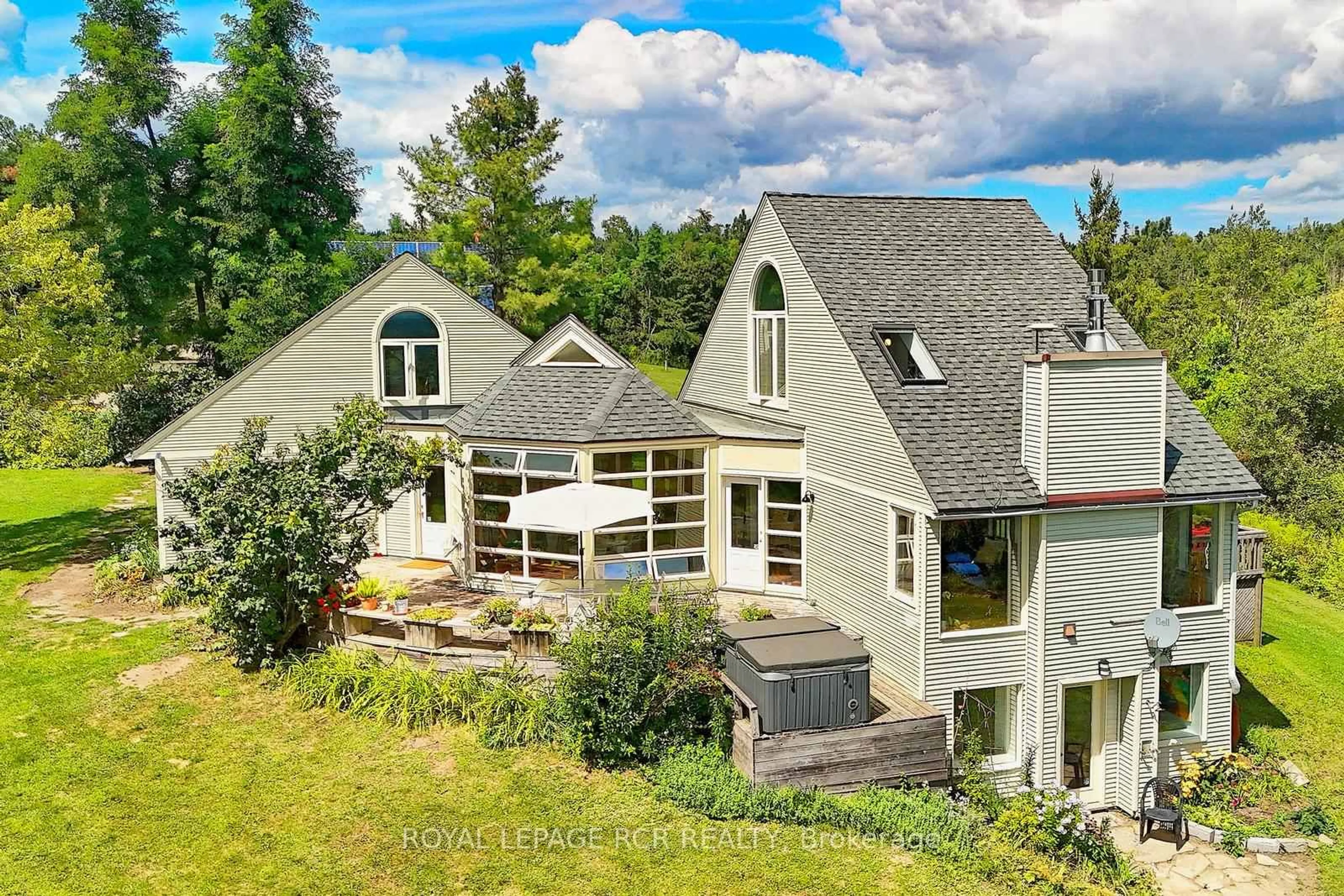 A pic from outside/outdoor area/front of a property/back of a property/a pic from drone, mountain view for 798433 3rd Line, Mulmur Ontario L9V 0H8