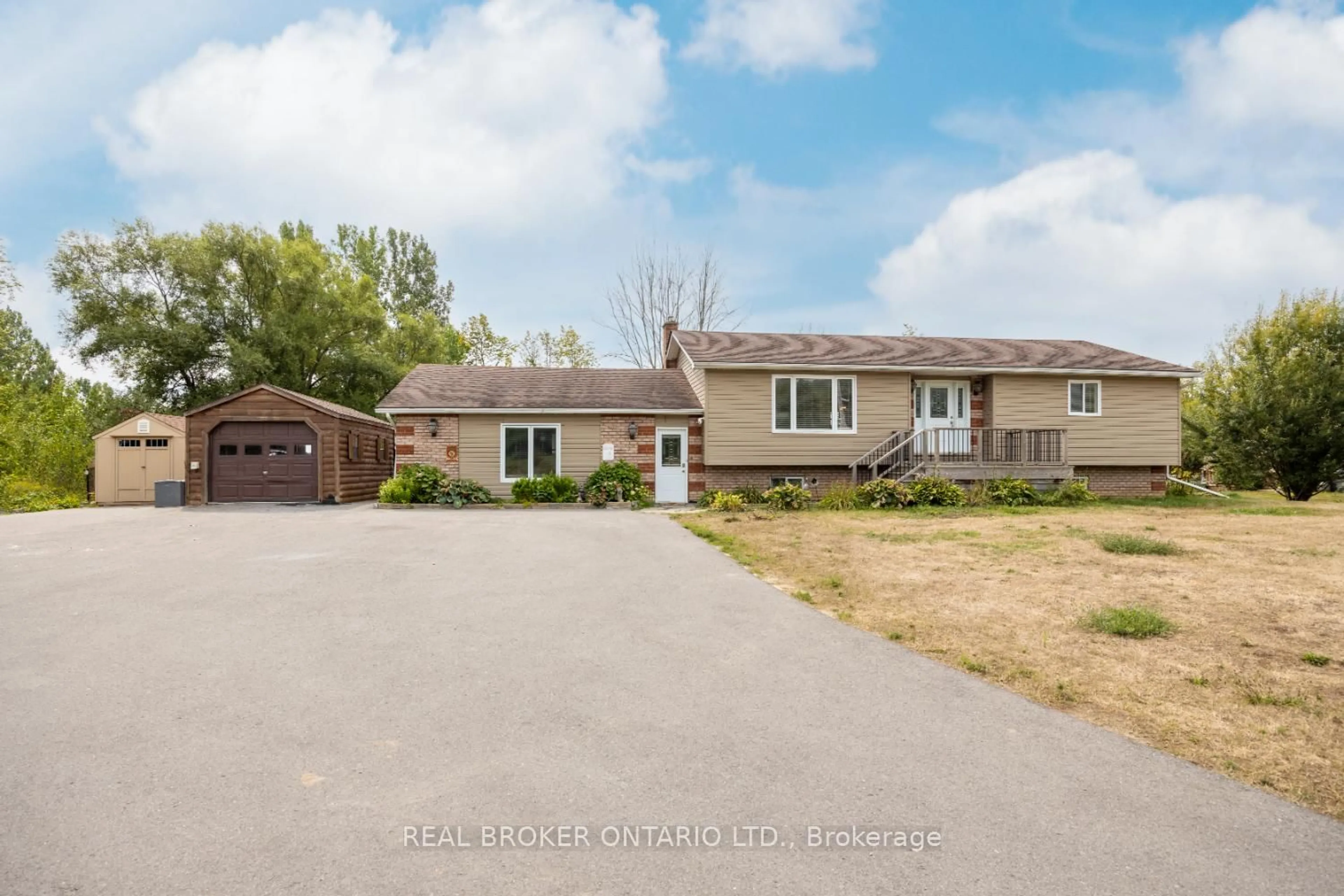 A pic from outside/outdoor area/front of a property/back of a property/a pic from drone, street for 15471 County Road 2, Brighton Ontario K0K 1H0