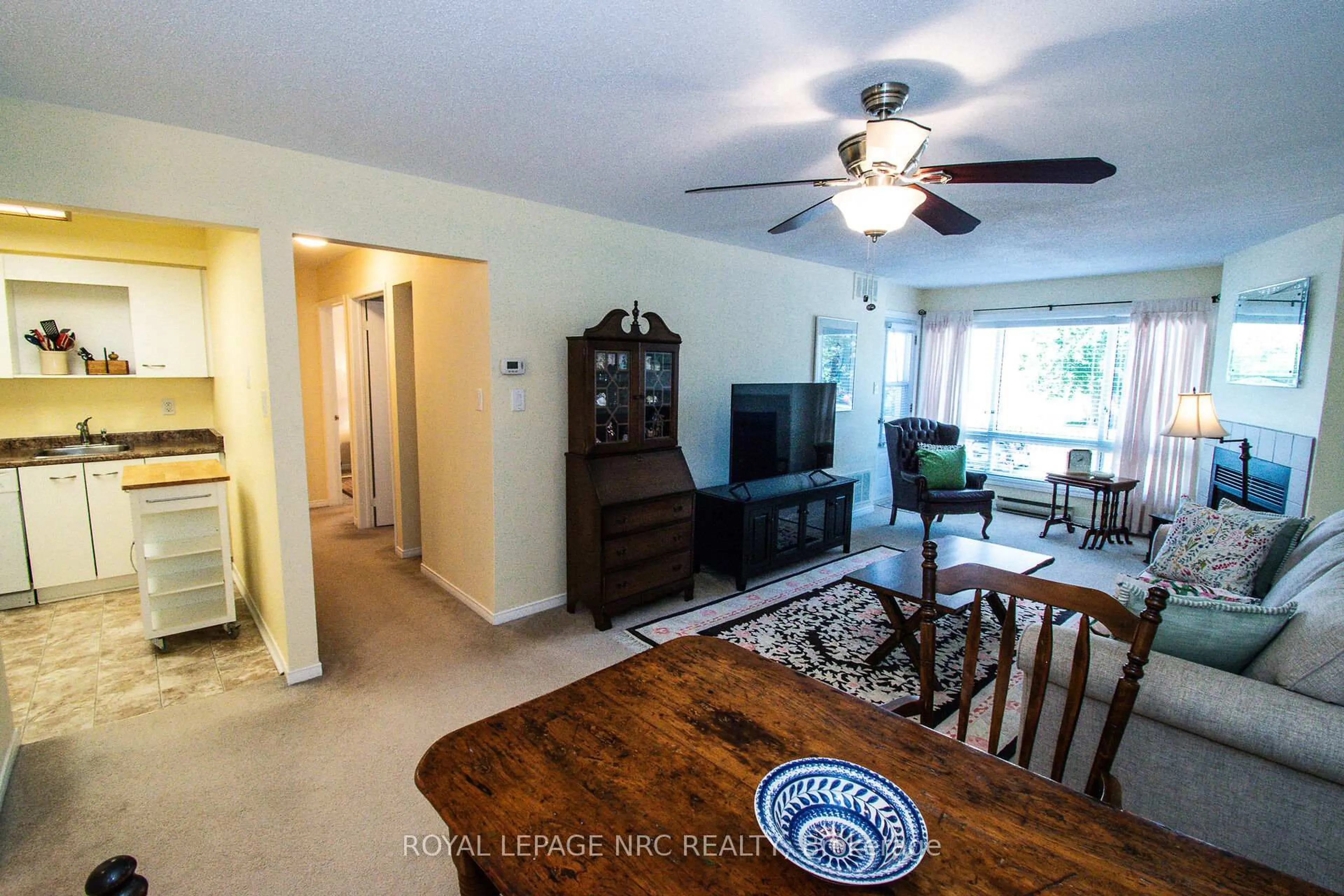 Living room with furniture, unknown for 78 Roehampton Ave #217, St. Catharines Ontario L2M 7W9