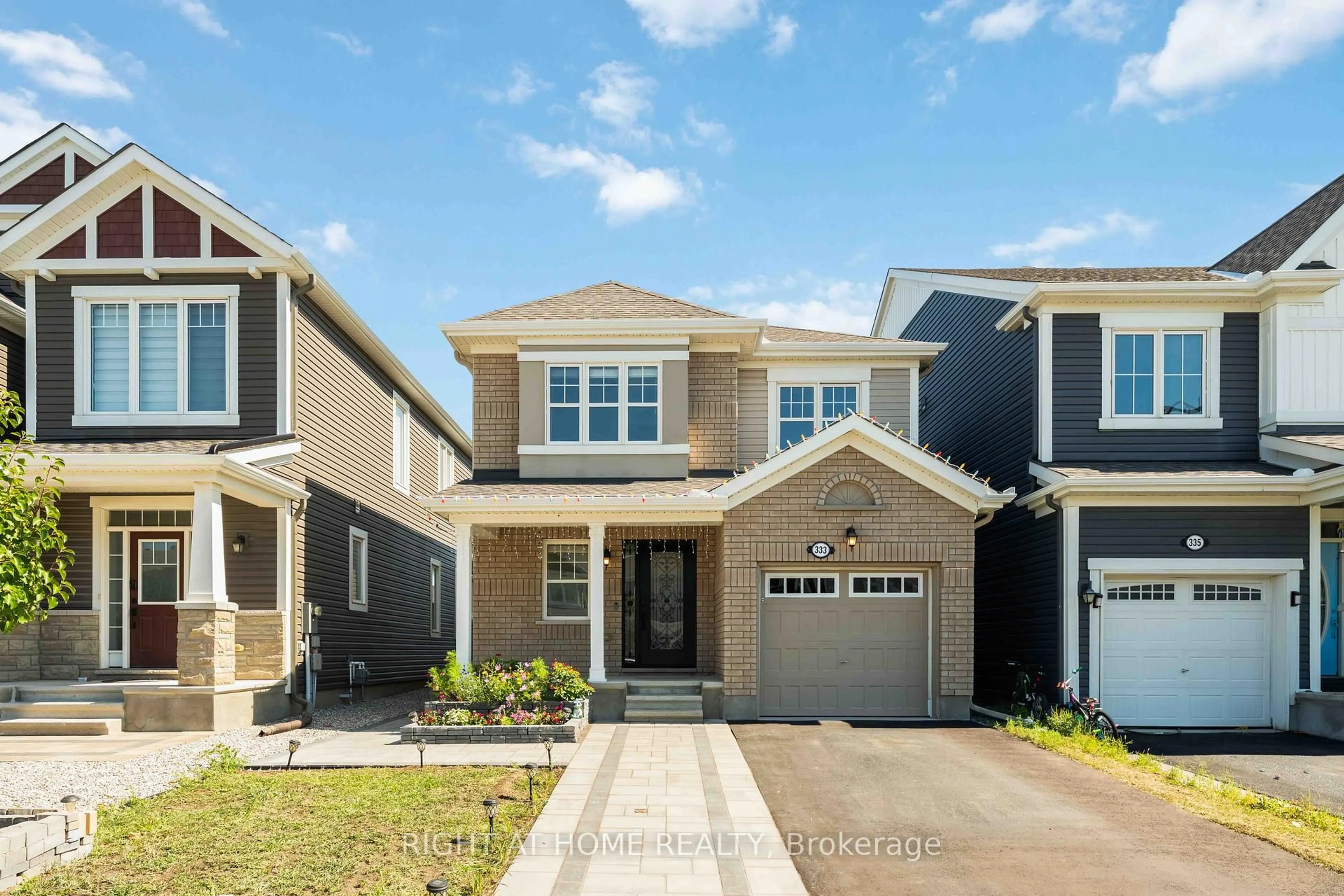 Home with vinyl exterior material, street for 333 Rouncey Rd, Ottawa Ontario K2V 0K4