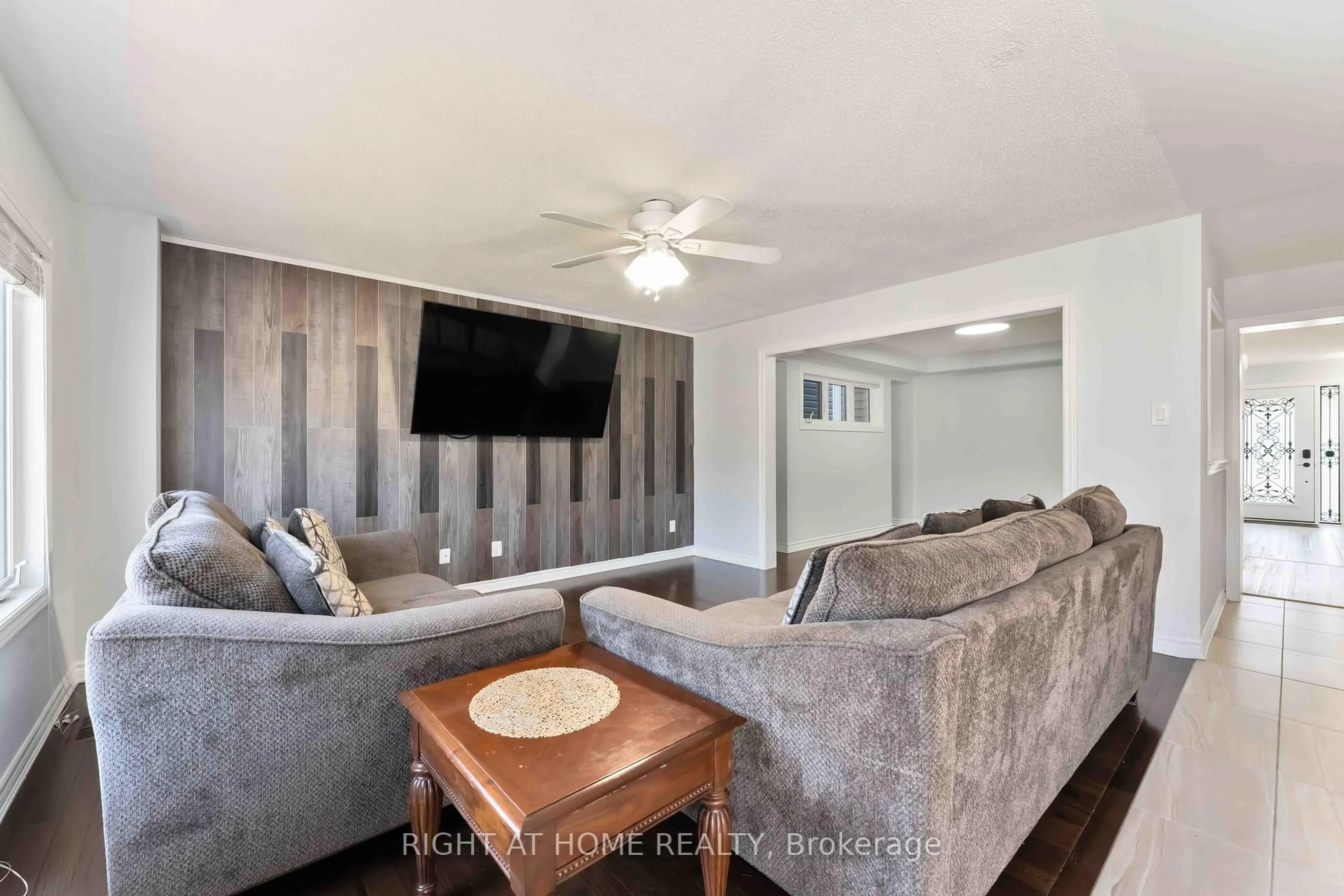 Living room with furniture, wood/laminate floor for 333 Rouncey Rd, Ottawa Ontario K2V 0K4
