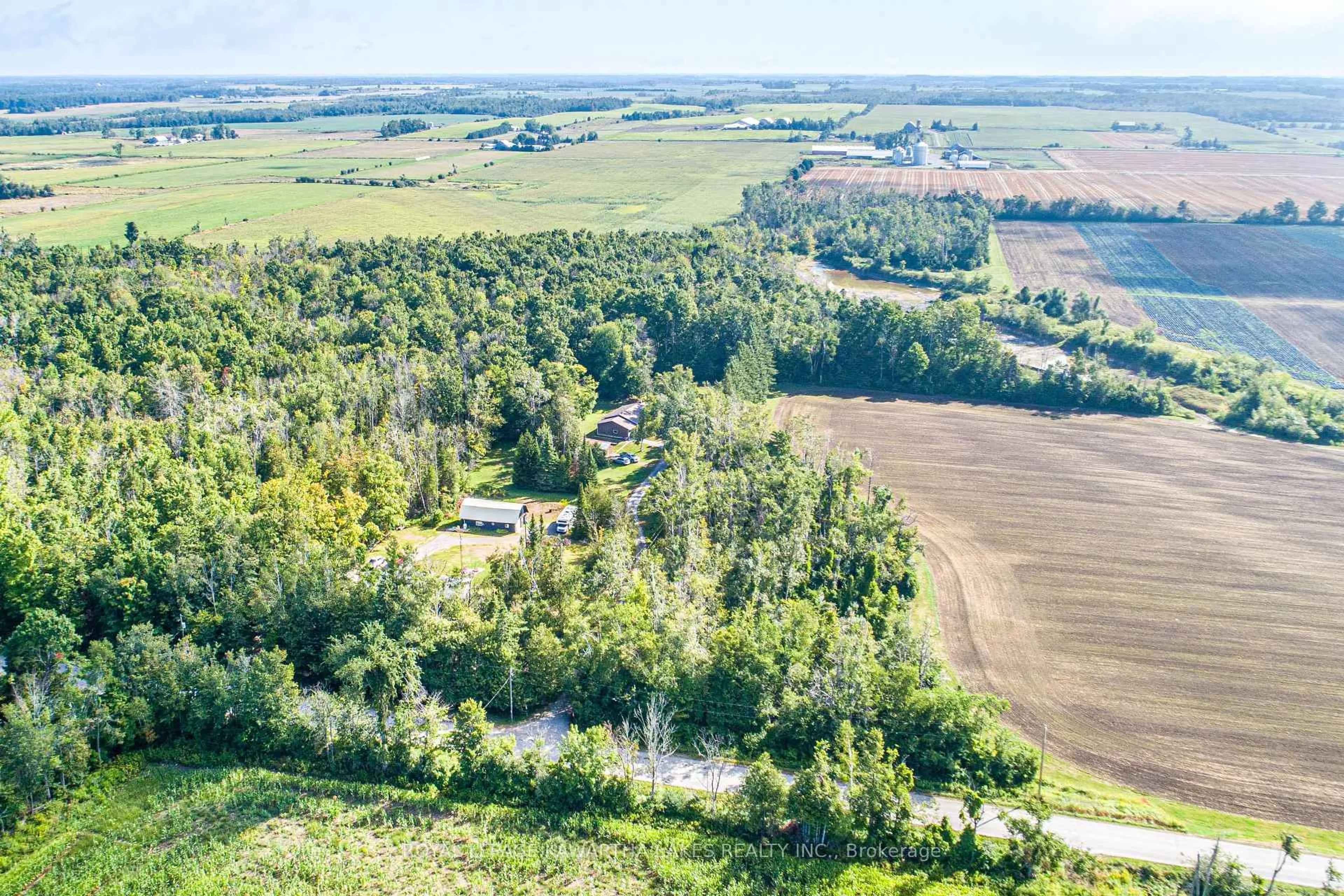 A pic from outside/outdoor area/front of a property/back of a property/a pic from drone, forest/trees view for 426 Farms Rd, Kawartha Lakes Ontario K0M 2T0