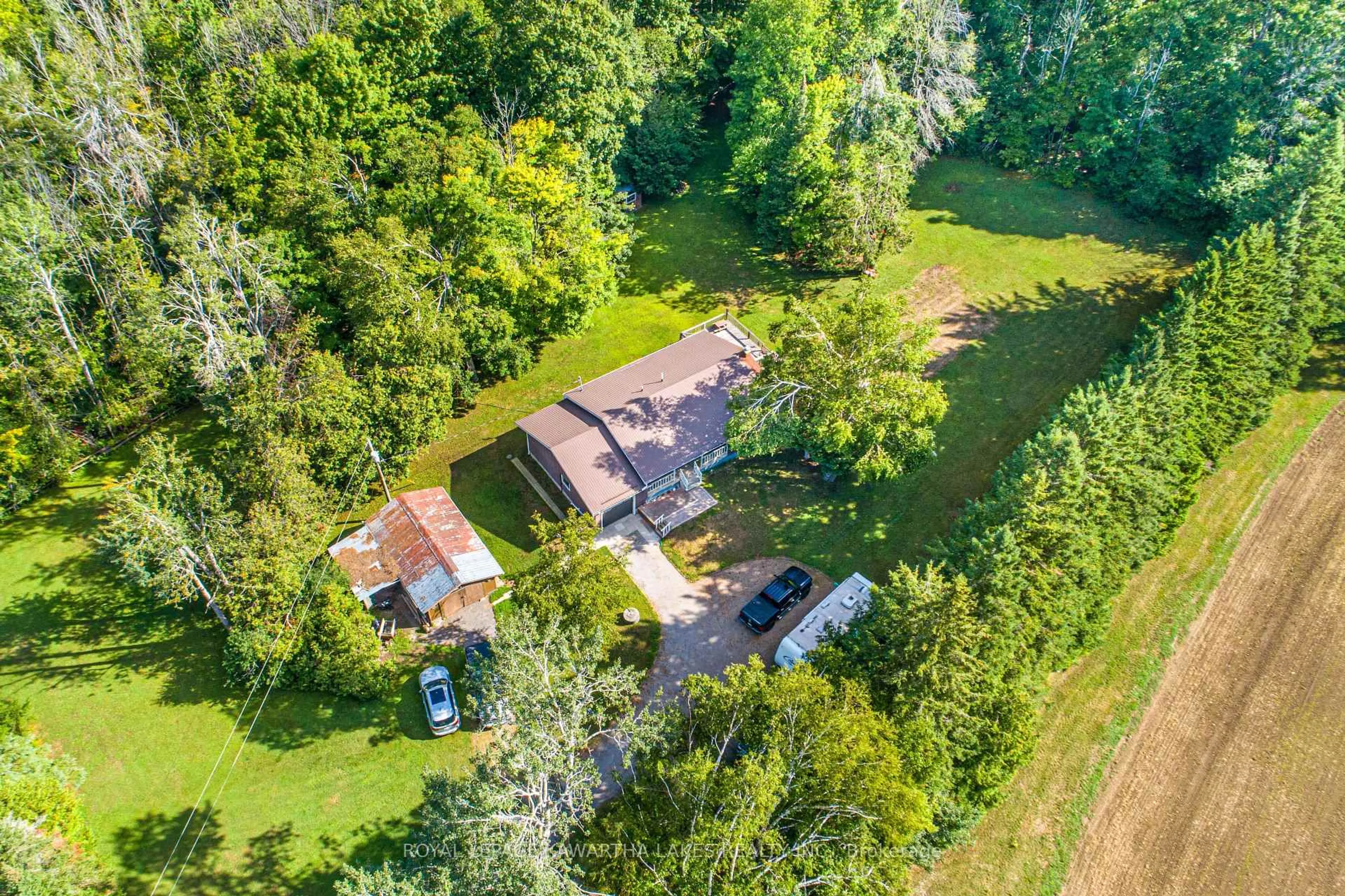 A pic from outside/outdoor area/front of a property/back of a property/a pic from drone, water/lake/river/ocean view for 426 Farms Rd, Kawartha Lakes Ontario K0M 2T0