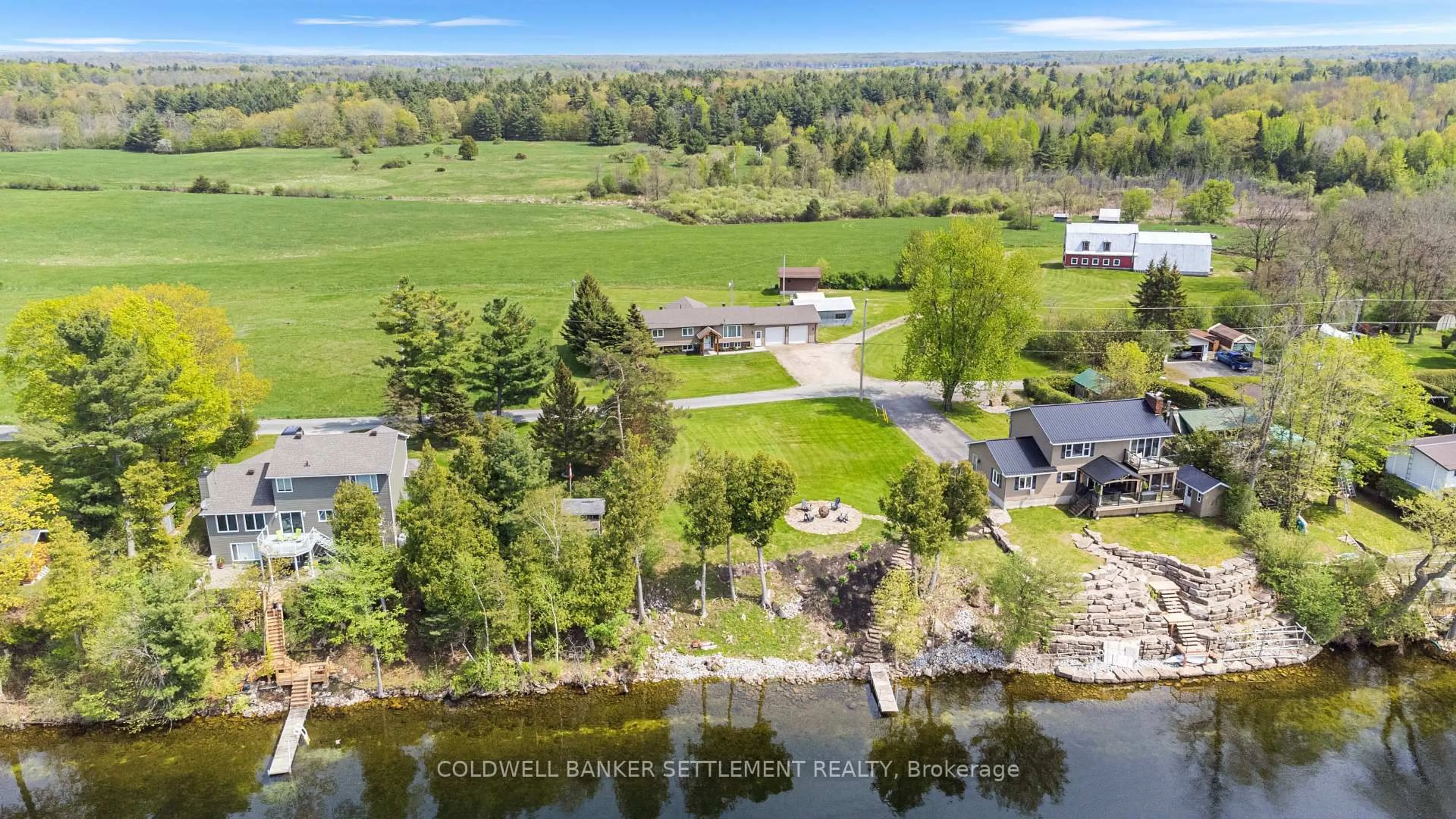 A pic from outside/outdoor area/front of a property/back of a property/a pic from drone, water/lake/river/ocean view for 269 Sunset Dr, Perth Ontario K7H 3C7