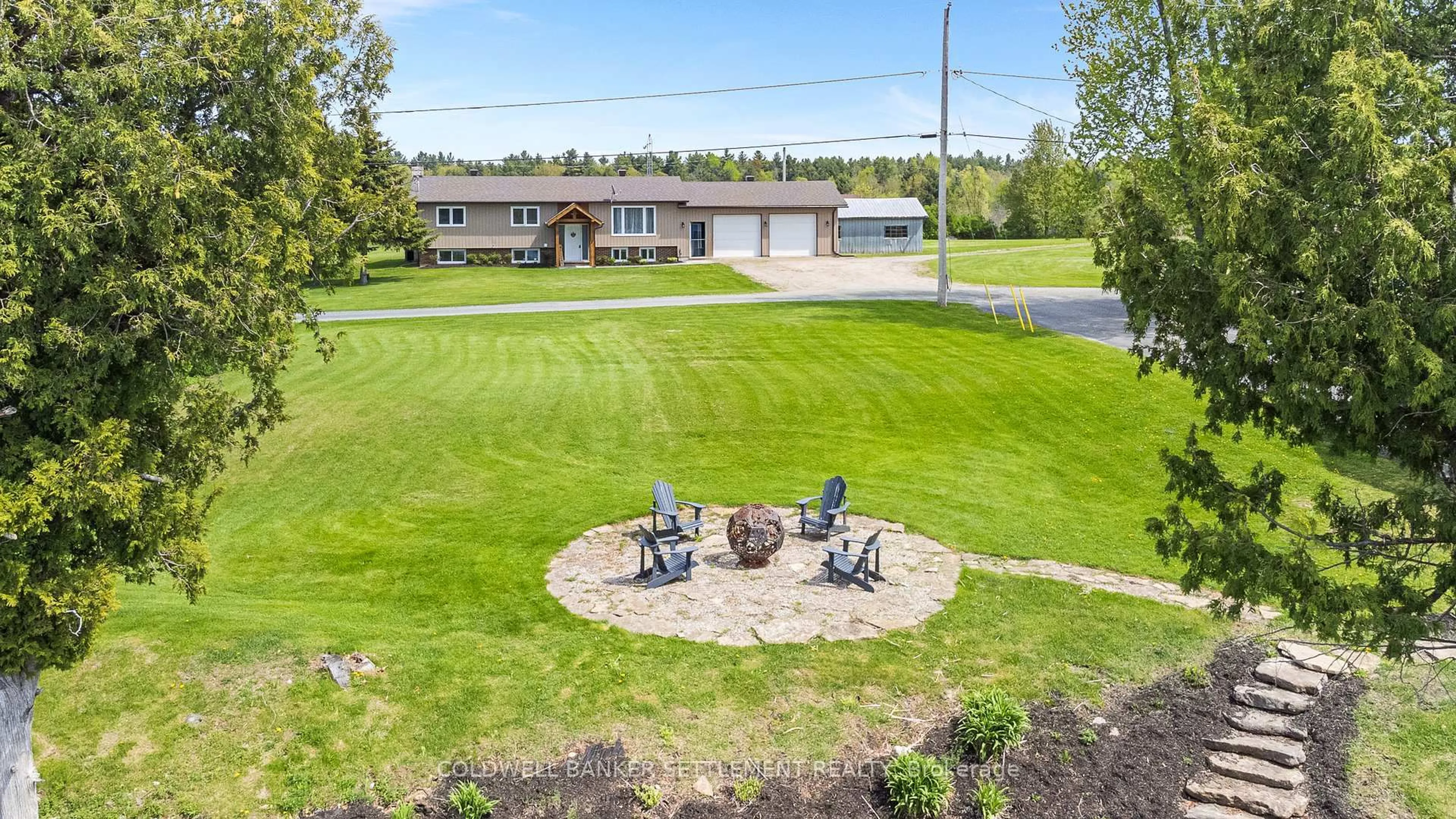 A pic from outside/outdoor area/front of a property/back of a property/a pic from drone, water/lake/river/ocean view for 269 Sunset Dr, Perth Ontario K7H 3C7