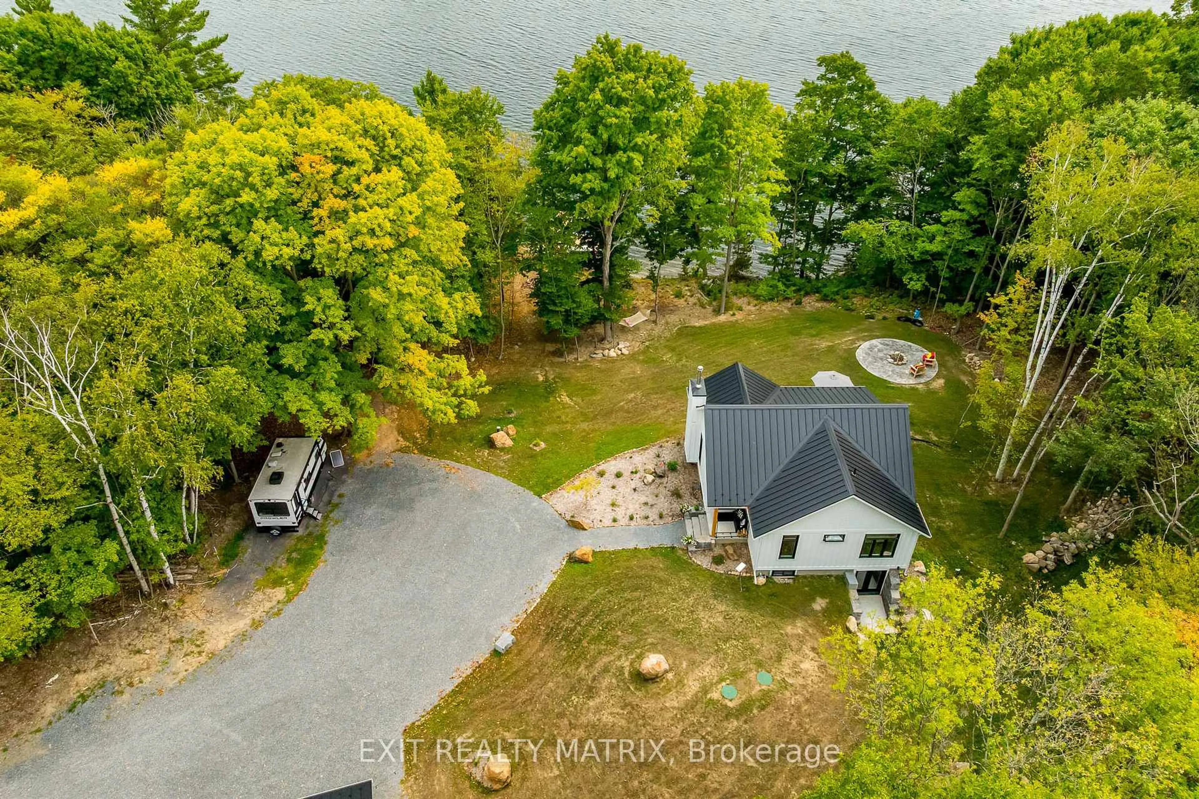 A pic from outside/outdoor area/front of a property/back of a property/a pic from drone, water/lake/river/ocean view for 26 Whiskey Point Lane, Godfrey Ontario K0H 1T0