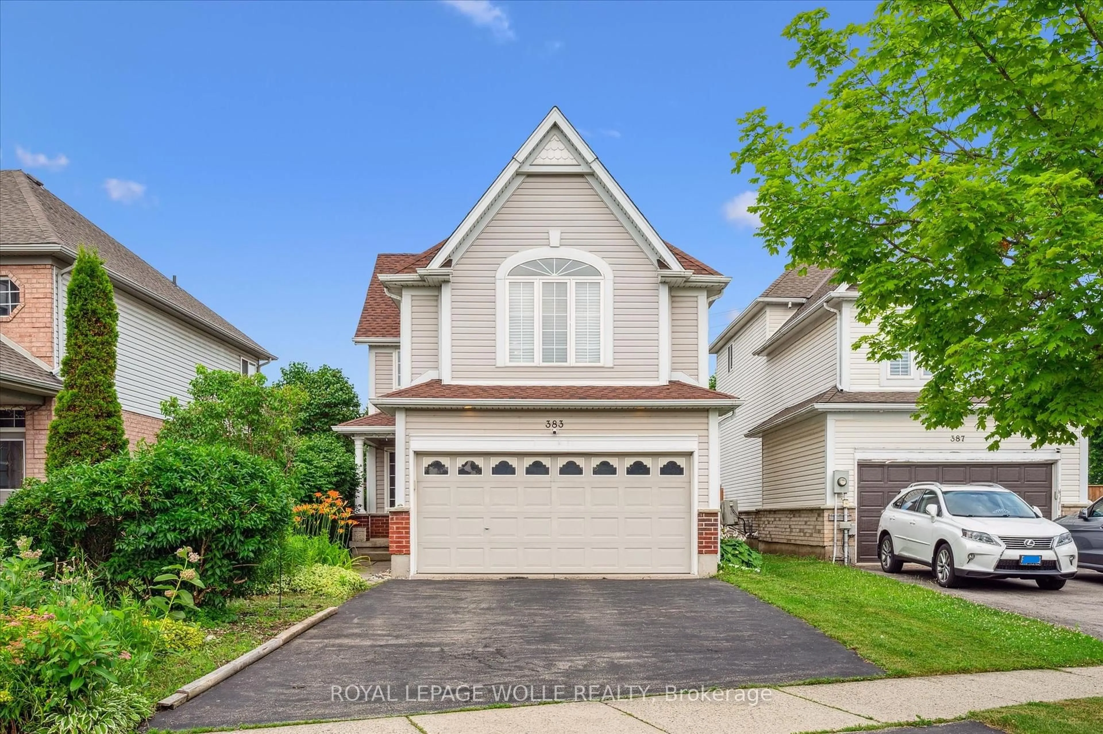 Home with vinyl exterior material, street for 383 Beaver Creek Rd, Waterloo Ontario N2T 2T2