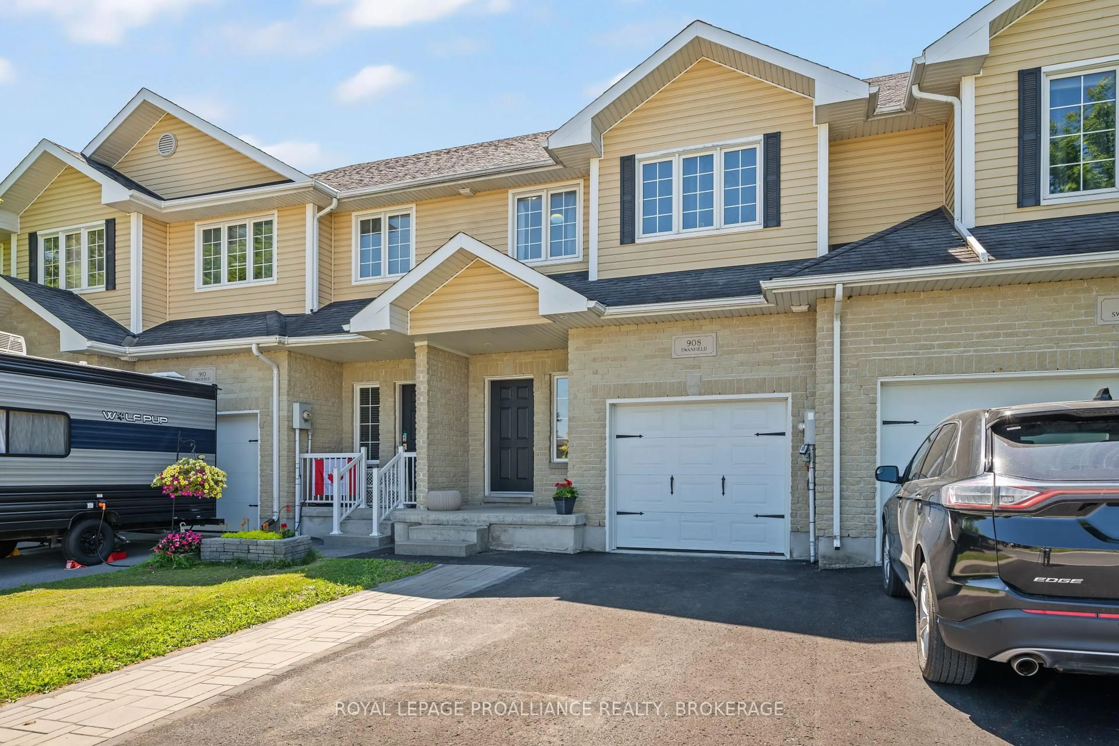 Home with vinyl exterior material, street for 908 Swanfield St, Kingston Ontario K7M 0A5