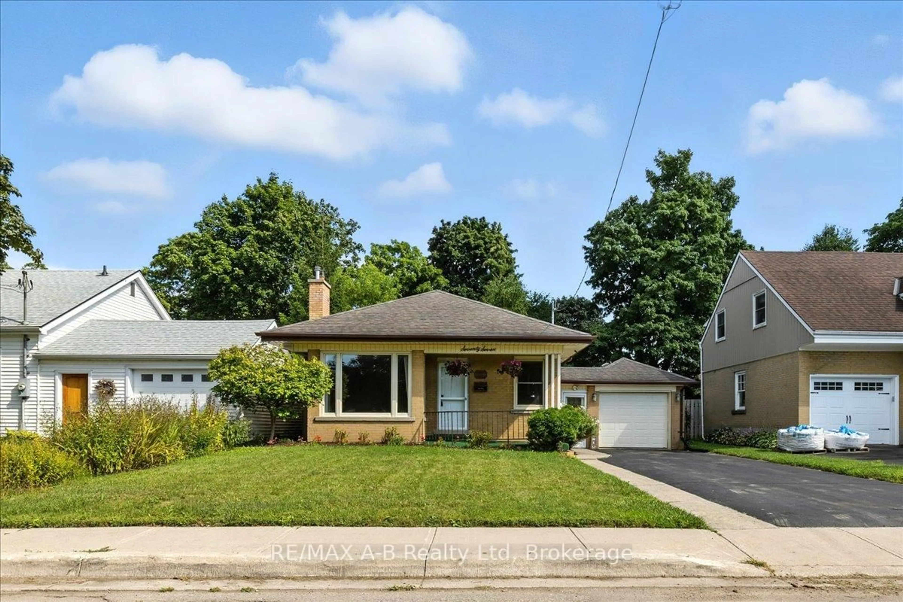 Home with brick exterior material, street for 77 Earl St, Stratford Ontario N5A 6G4