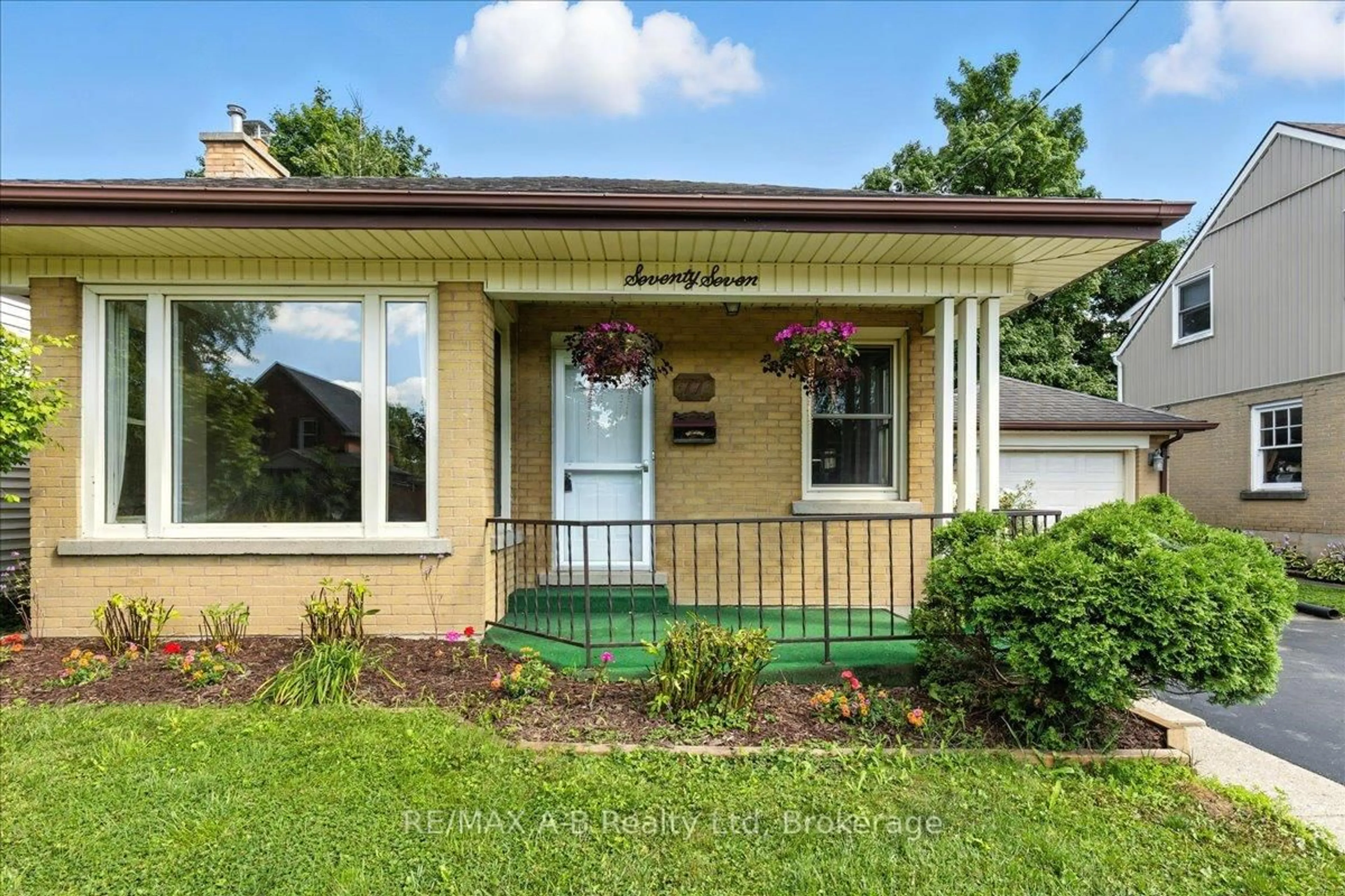 Home with vinyl exterior material, street for 77 Earl St, Stratford Ontario N5A 6G4
