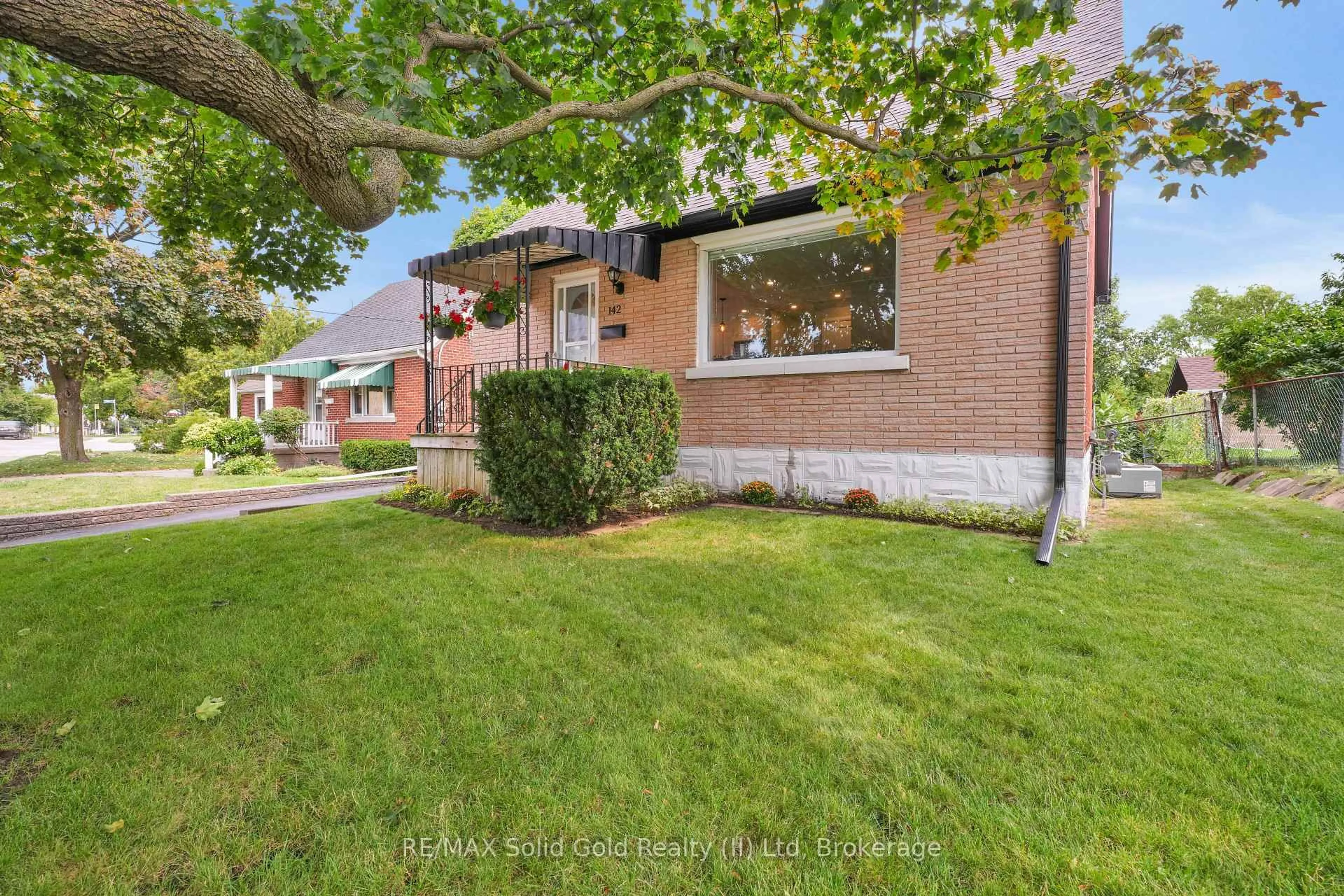 Home with brick exterior material, street for 142 Lancaster St, Kitchener Ontario N2H 4T6
