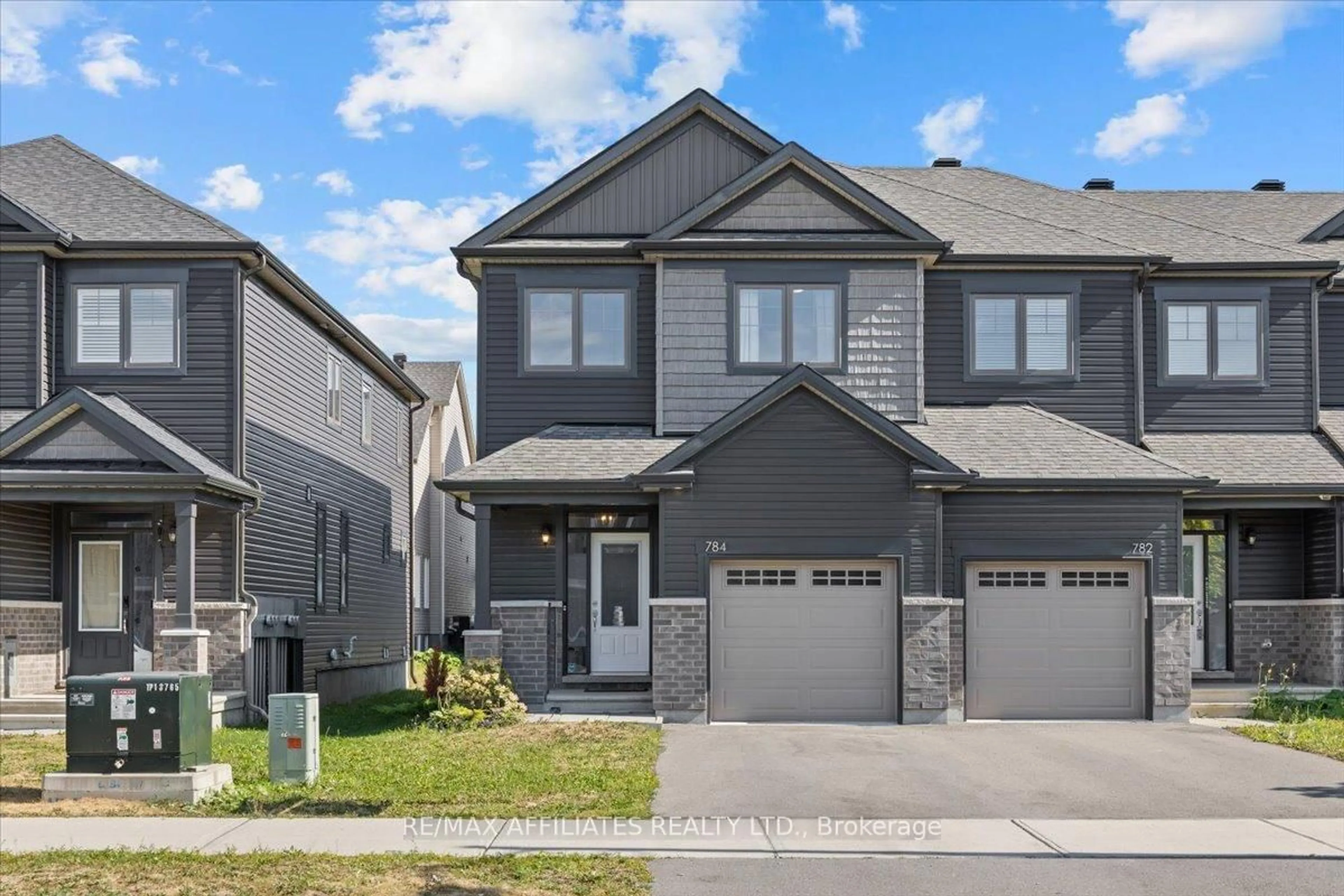 Home with vinyl exterior material, street for 784 Miikana Rd, Ottawa Ontario K1X 0G5