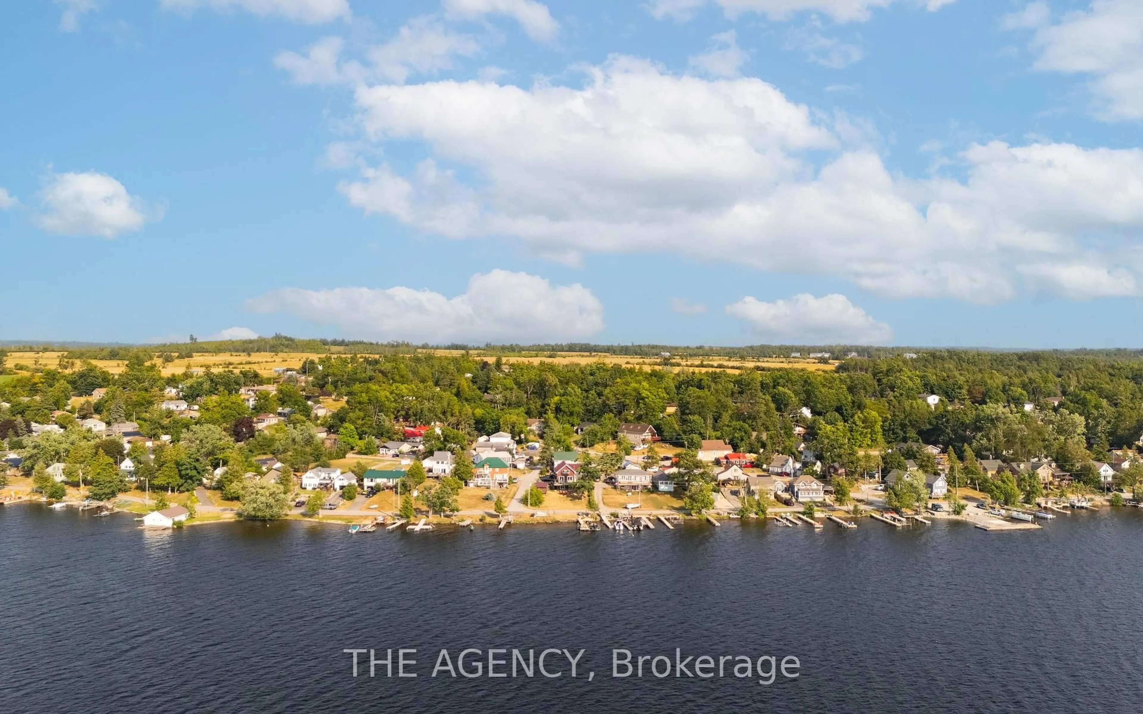 A pic from outside/outdoor area/front of a property/back of a property/a pic from drone, water/lake/river/ocean view for 11 Fifth St, Kawartha Lakes Ontario K0M 1L0