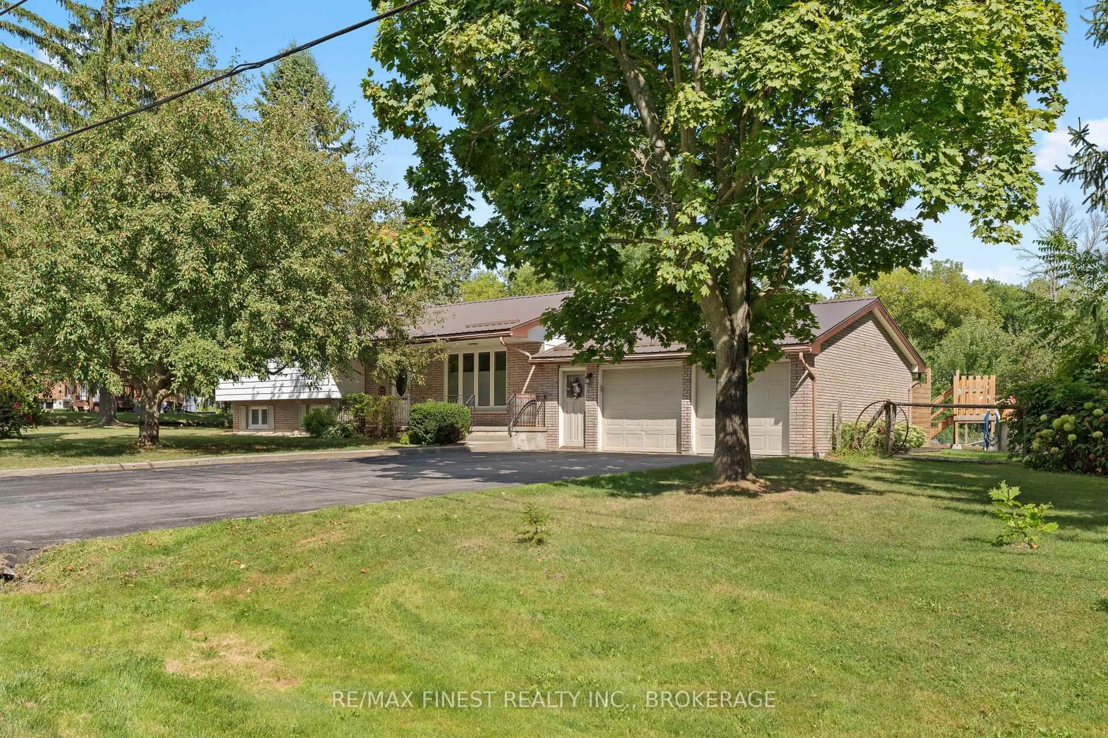 A pic from outside/outdoor area/front of a property/back of a property/a pic from drone, street for 6028 McMahon Dr, Frontenac Ontario K0H 0B8