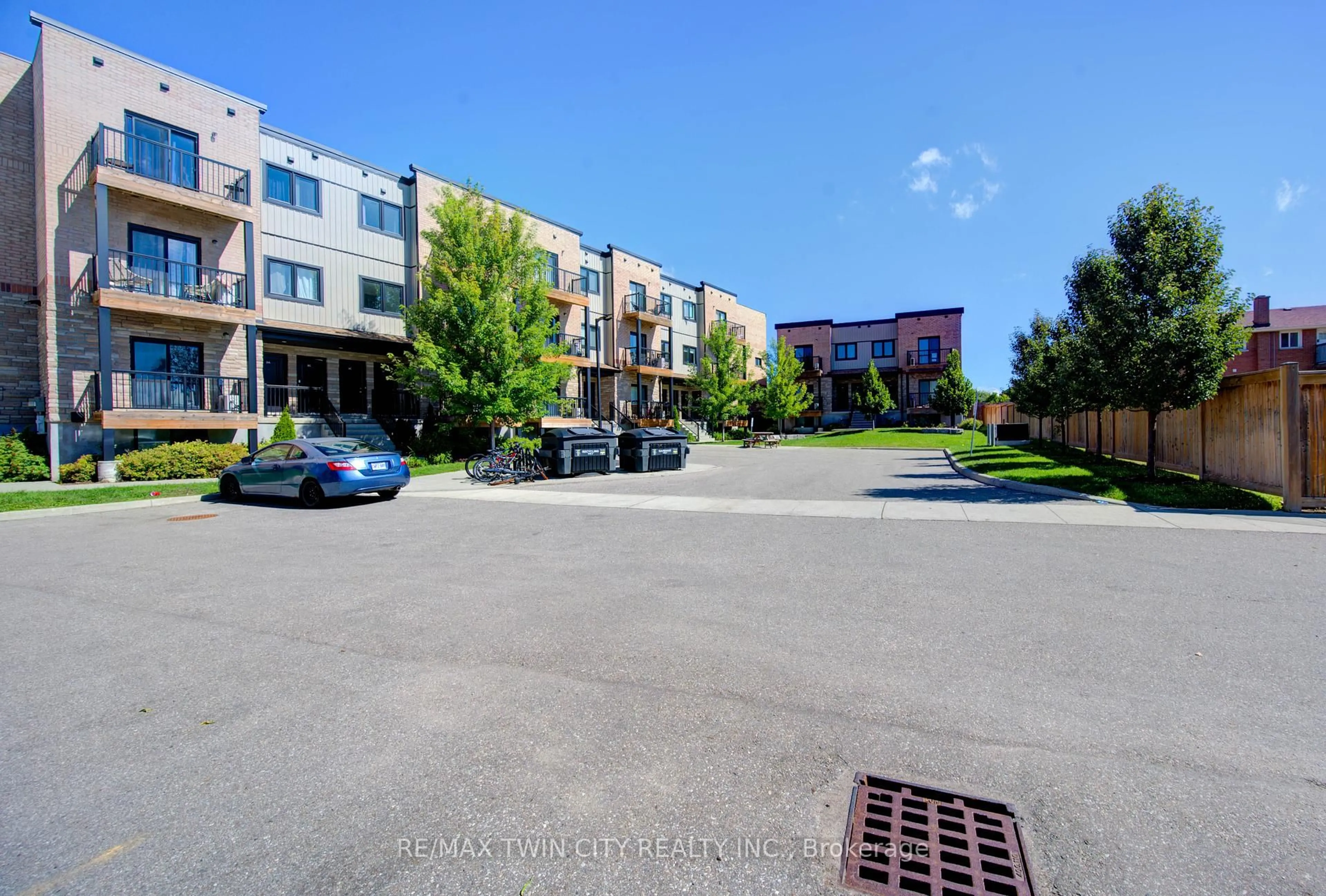 A pic from outside/outdoor area/front of a property/back of a property/a pic from drone, street for 164 Heiman St #9C, Kitchener Ontario N2M 0B8