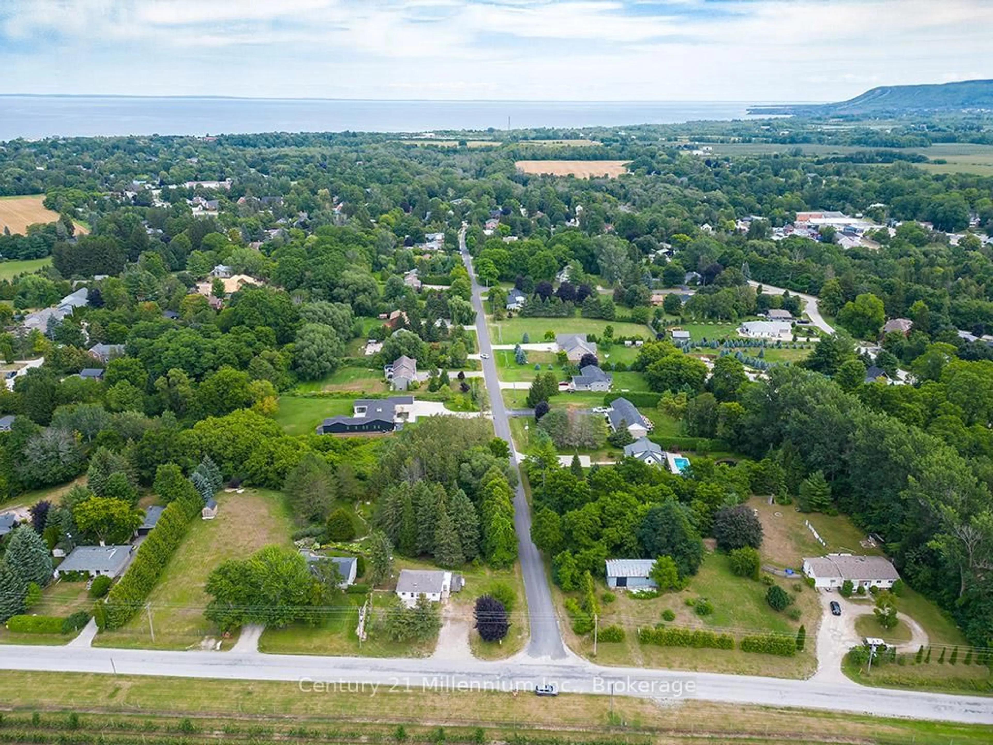 A pic from outside/outdoor area/front of a property/back of a property/a pic from drone, street for 417047 Tenth Line, Blue Mountains Ontario N0H 1J0