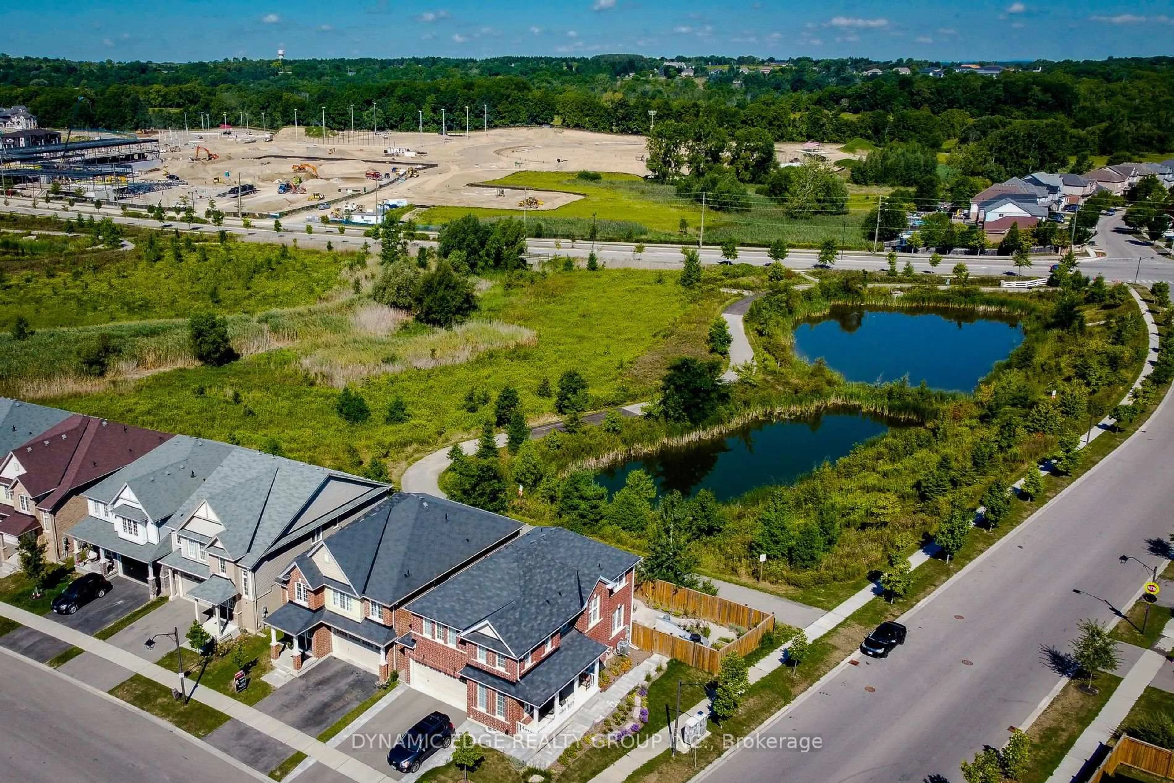 A pic from outside/outdoor area/front of a property/back of a property/a pic from drone, water/lake/river/ocean view for 84 Longboat Run, Brantford Ontario N3T 5L5