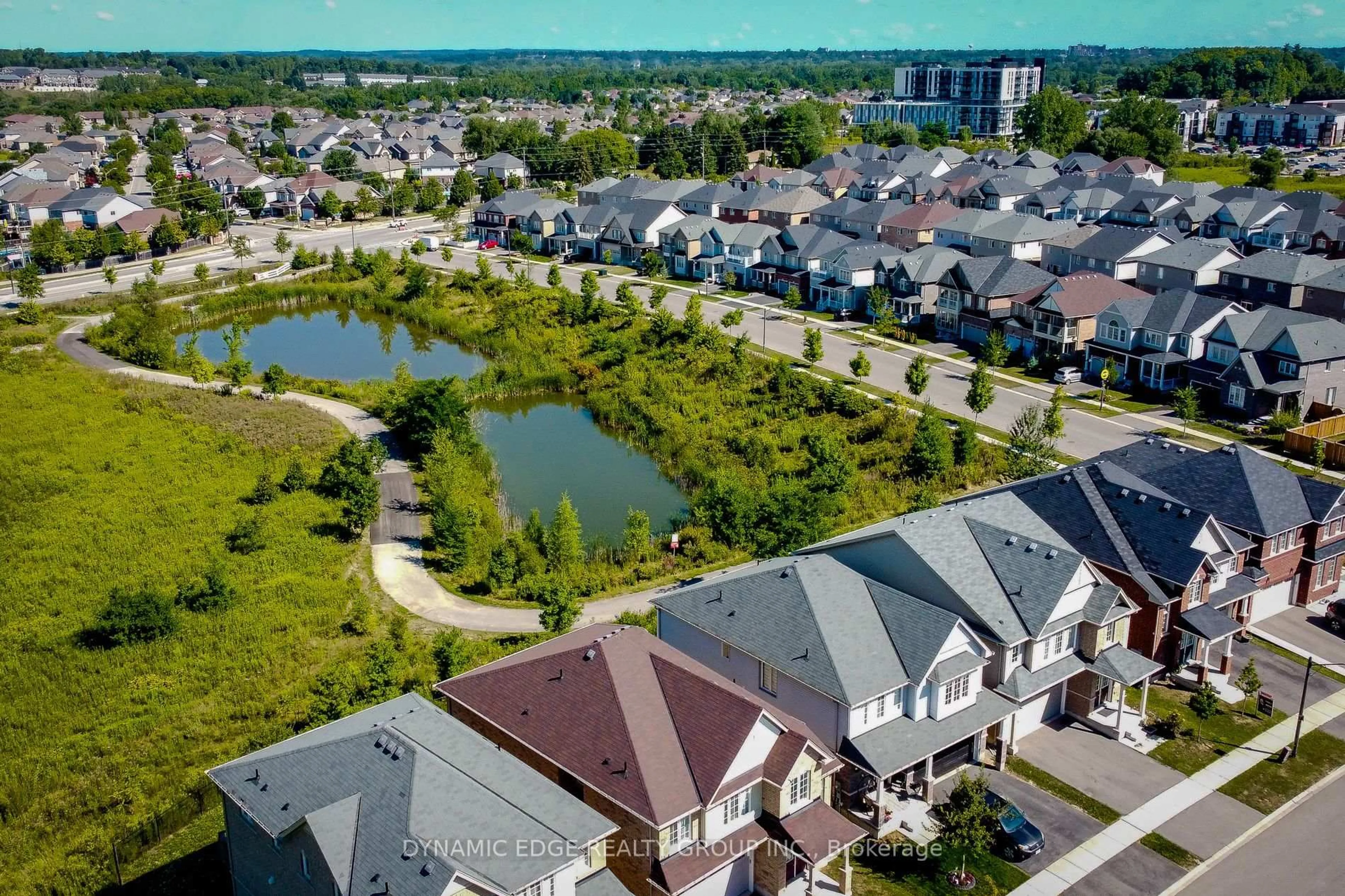 A pic from outside/outdoor area/front of a property/back of a property/a pic from drone, water/lake/river/ocean view for 84 Longboat Run, Brantford Ontario N3T 5L5