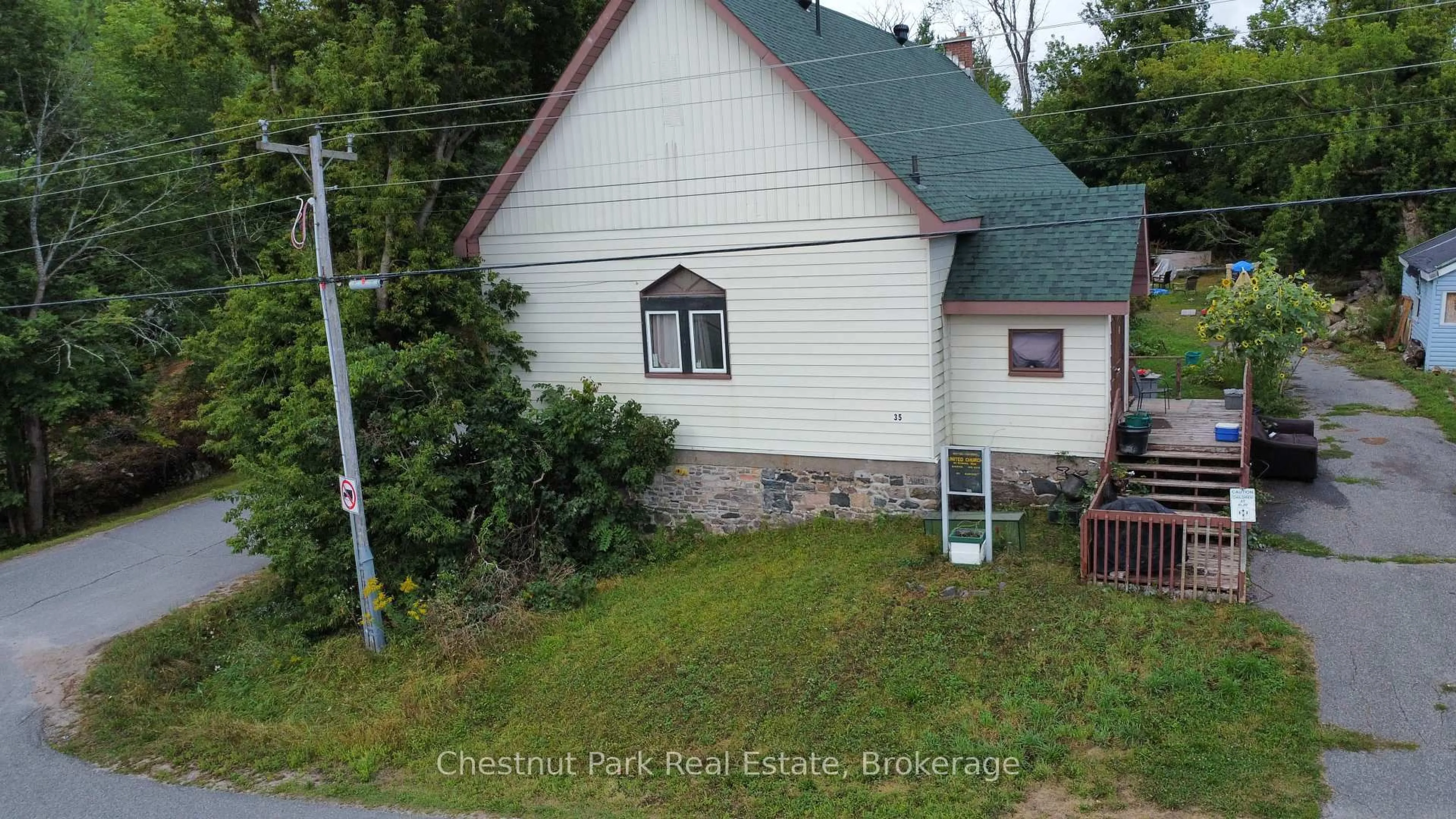 A pic from outside/outdoor area/front of a property/back of a property/a pic from drone, street for 35 MUSKOKA Rd, Georgian Bay Ontario P0C 1H0
