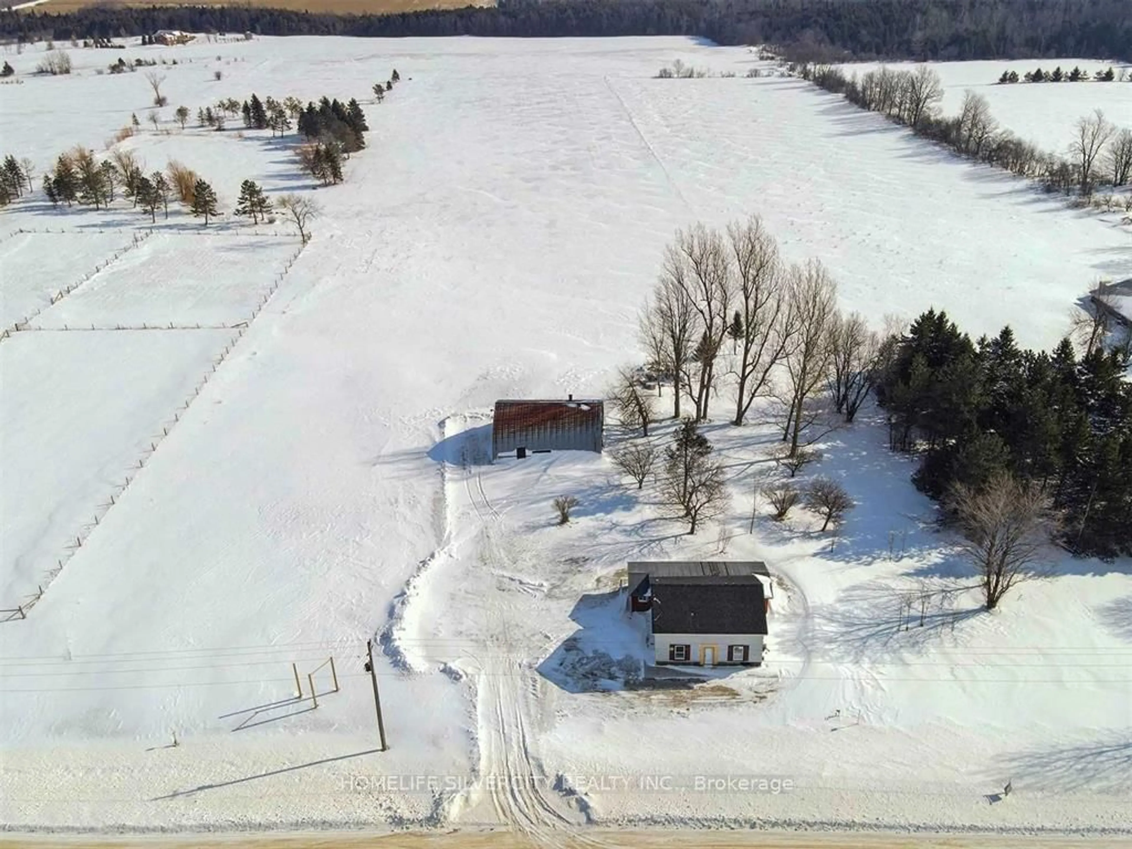 A pic from outside/outdoor area/front of a property/back of a property/a pic from drone, unknown for 634555 Highway 10 Rd, Mono Ontario L9W 2Z1