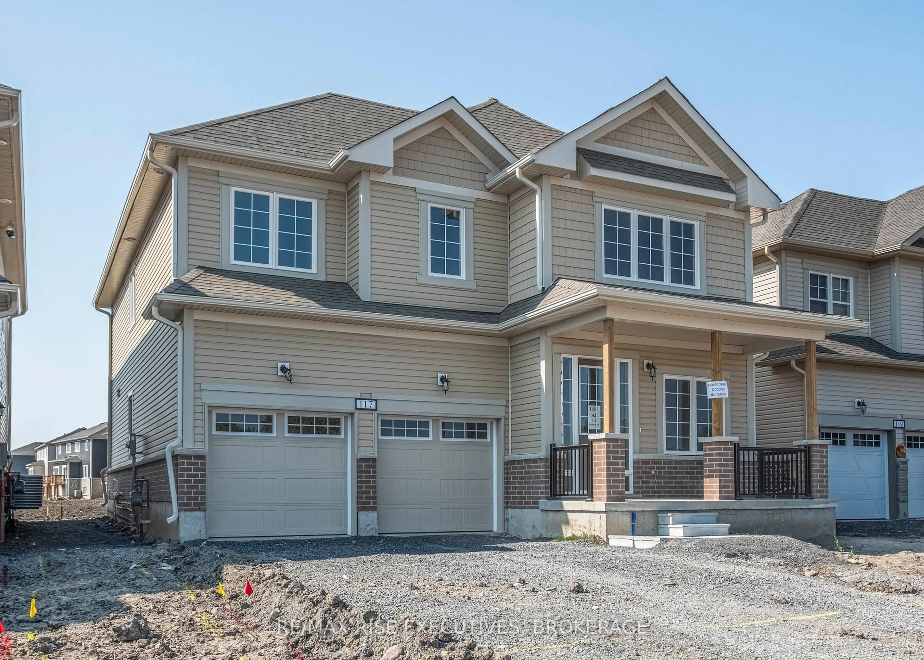 Home with vinyl exterior material, street for 117 WINDERMERE Blvd, Bath Ontario K0H 1G0
