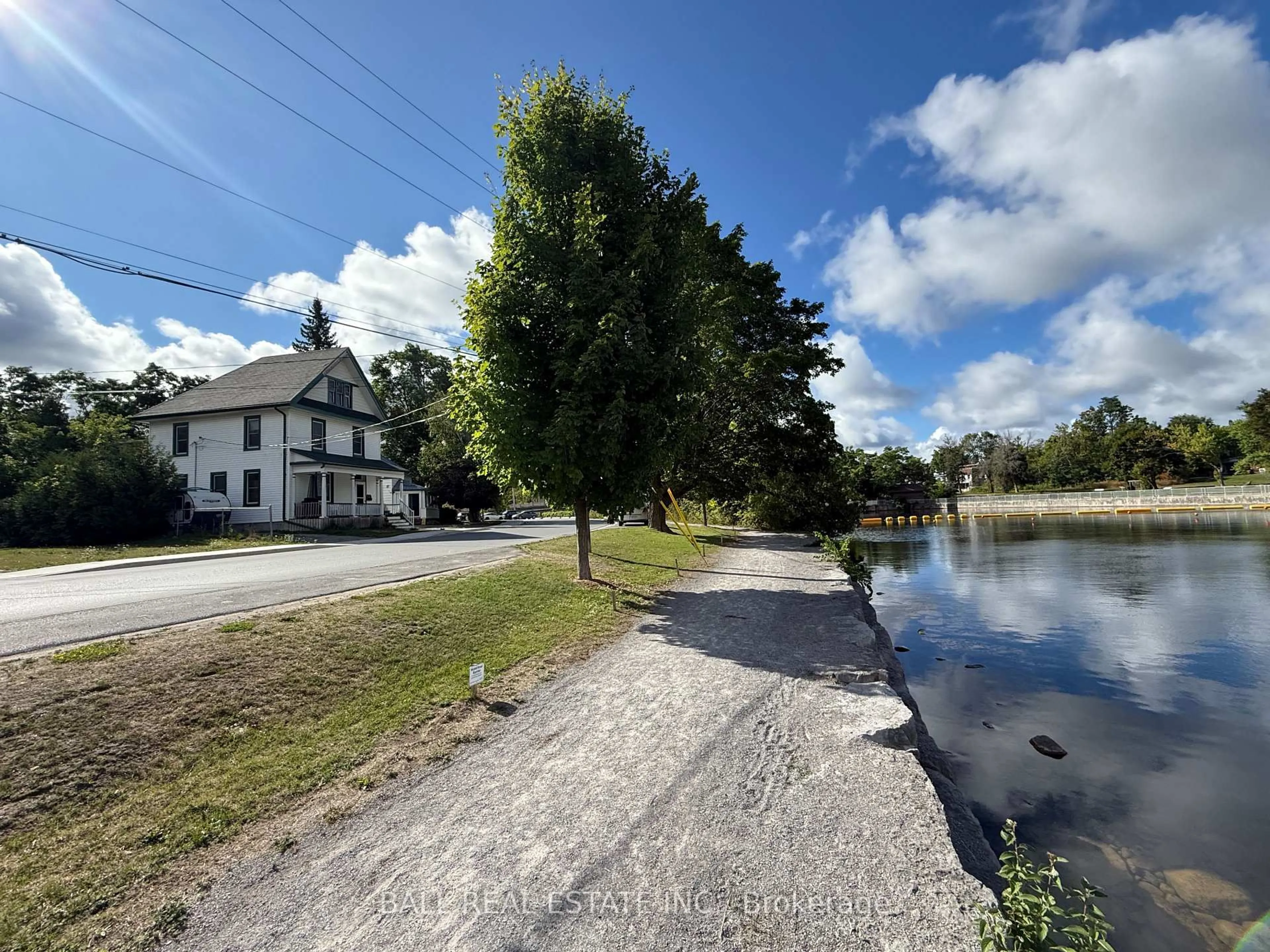 A pic from outside/outdoor area/front of a property/back of a property/a pic from drone, water/lake/river/ocean view for 134 Water St, Selwyn Ontario K0L 2H0