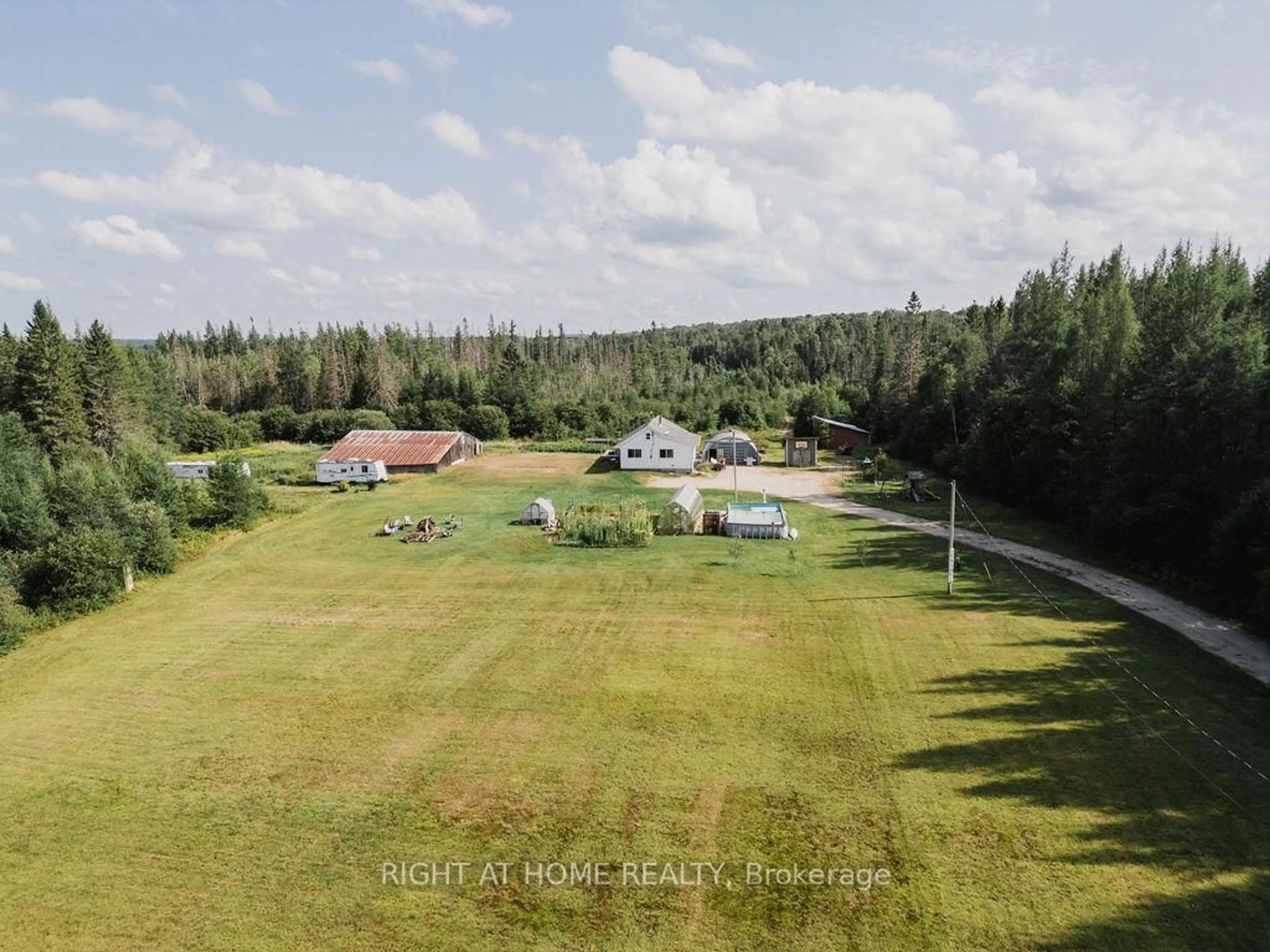 A pic from outside/outdoor area/front of a property/back of a property/a pic from drone, unknown for 47 Peacock Rd, Strong Ontario P0A 1Z0