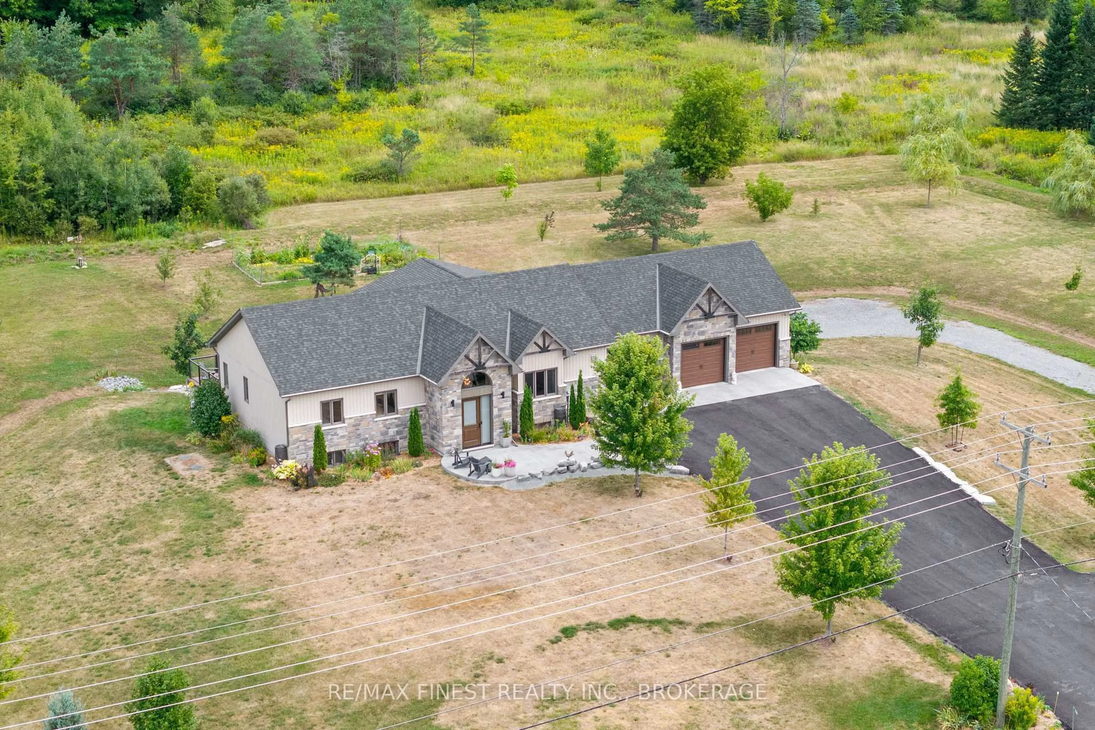 A pic from outside/outdoor area/front of a property/back of a property/a pic from drone, mountain view for 3266 Harrowsmith Rd, Harrowsmith Ontario K0H 1V0