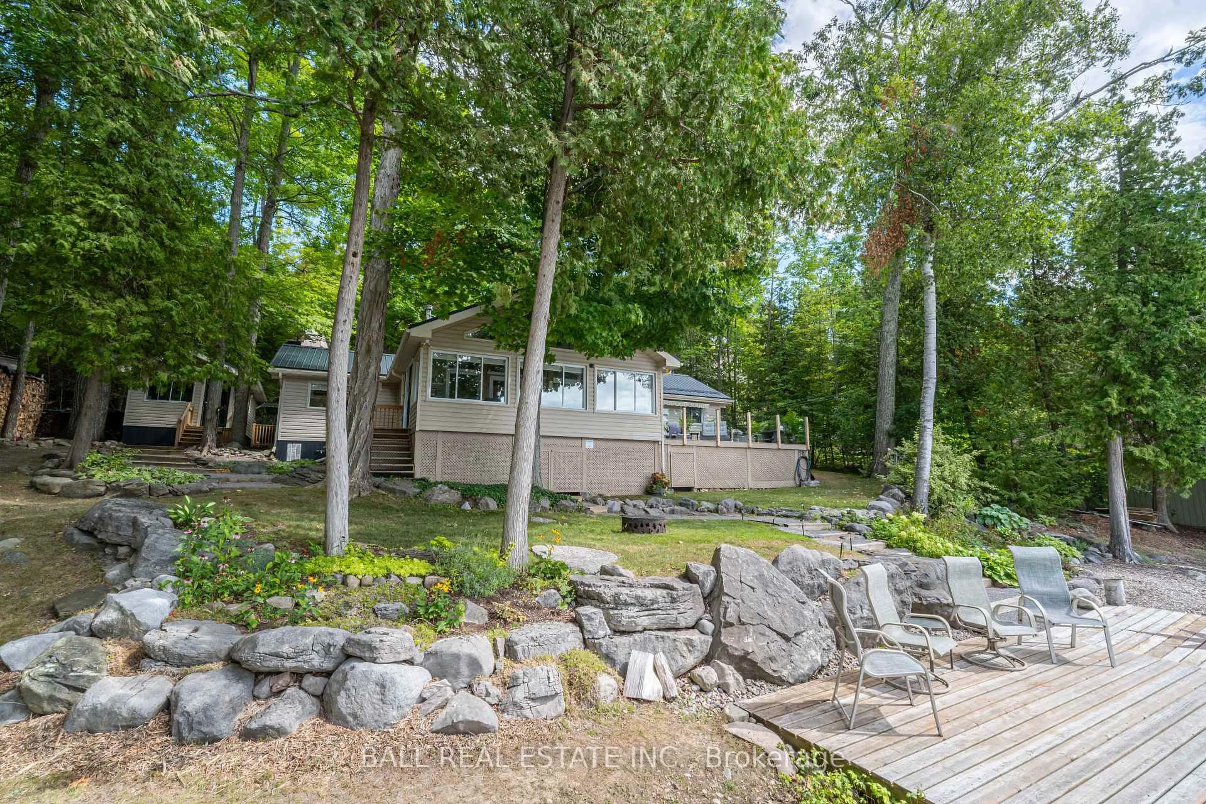 A pic from outside/outdoor area/front of a property/back of a property/a pic from drone, water/lake/river/ocean view for 27 Maplewood Crt, Trent Lakes Ontario K0L 1J0