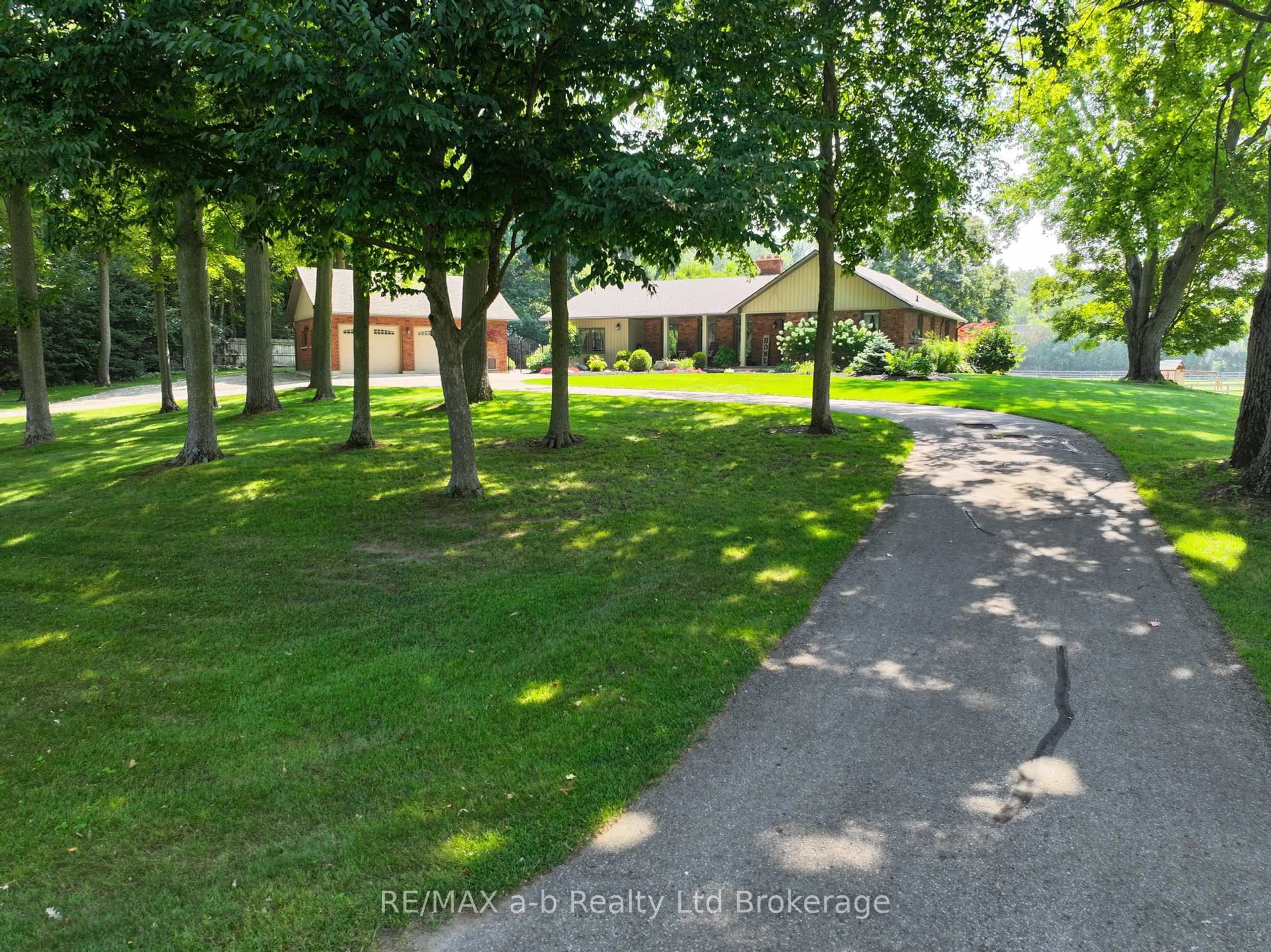 A pic from outside/outdoor area/front of a property/back of a property/a pic from drone, street for 240 BURWELL ROAD, Norfolk Ontario N4G 4G7