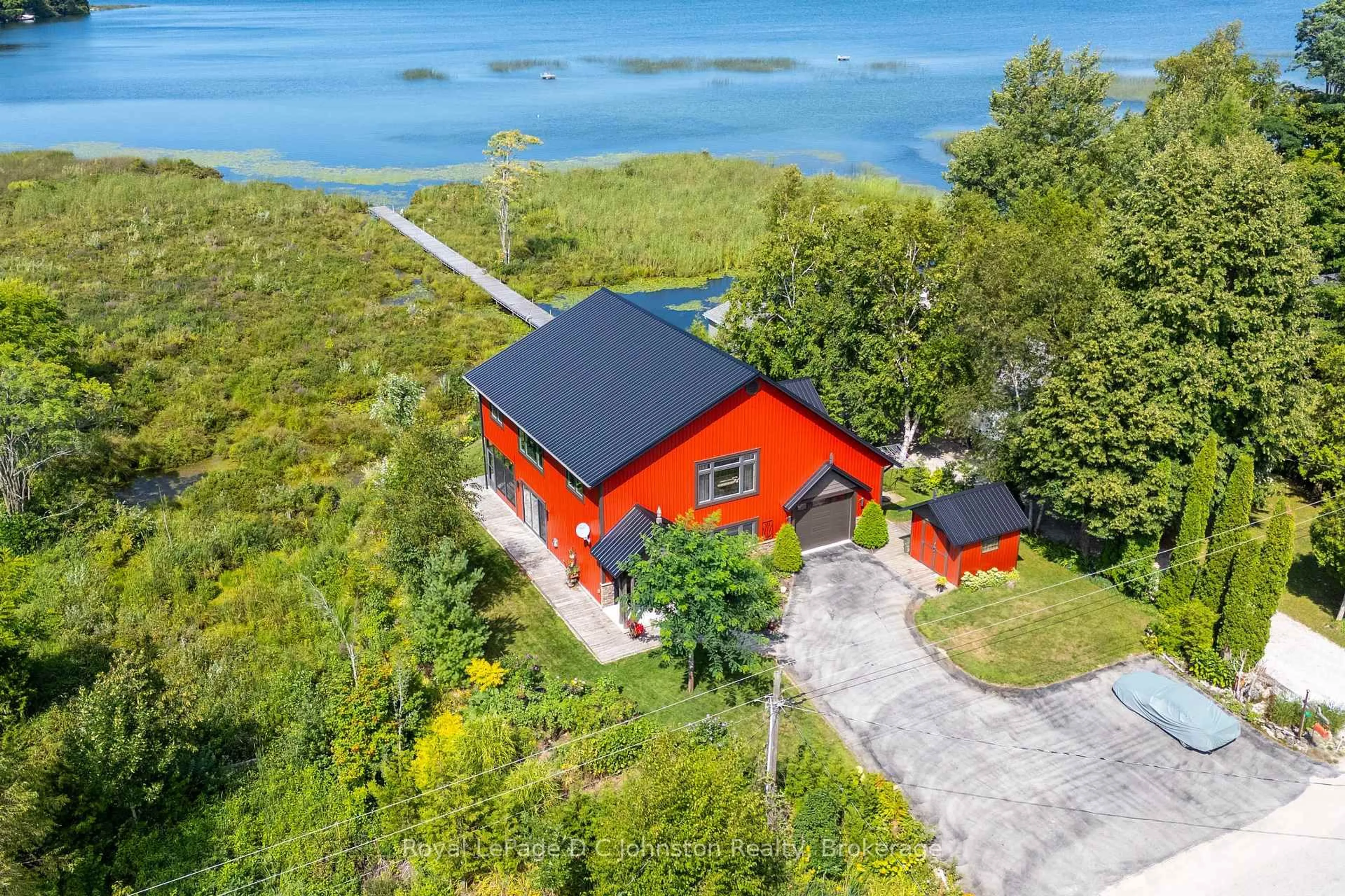 A pic from outside/outdoor area/front of a property/back of a property/a pic from drone, water/lake/river/ocean view for 11 Lake Dr, South Bruce Peninsula Ontario N0H 1A0