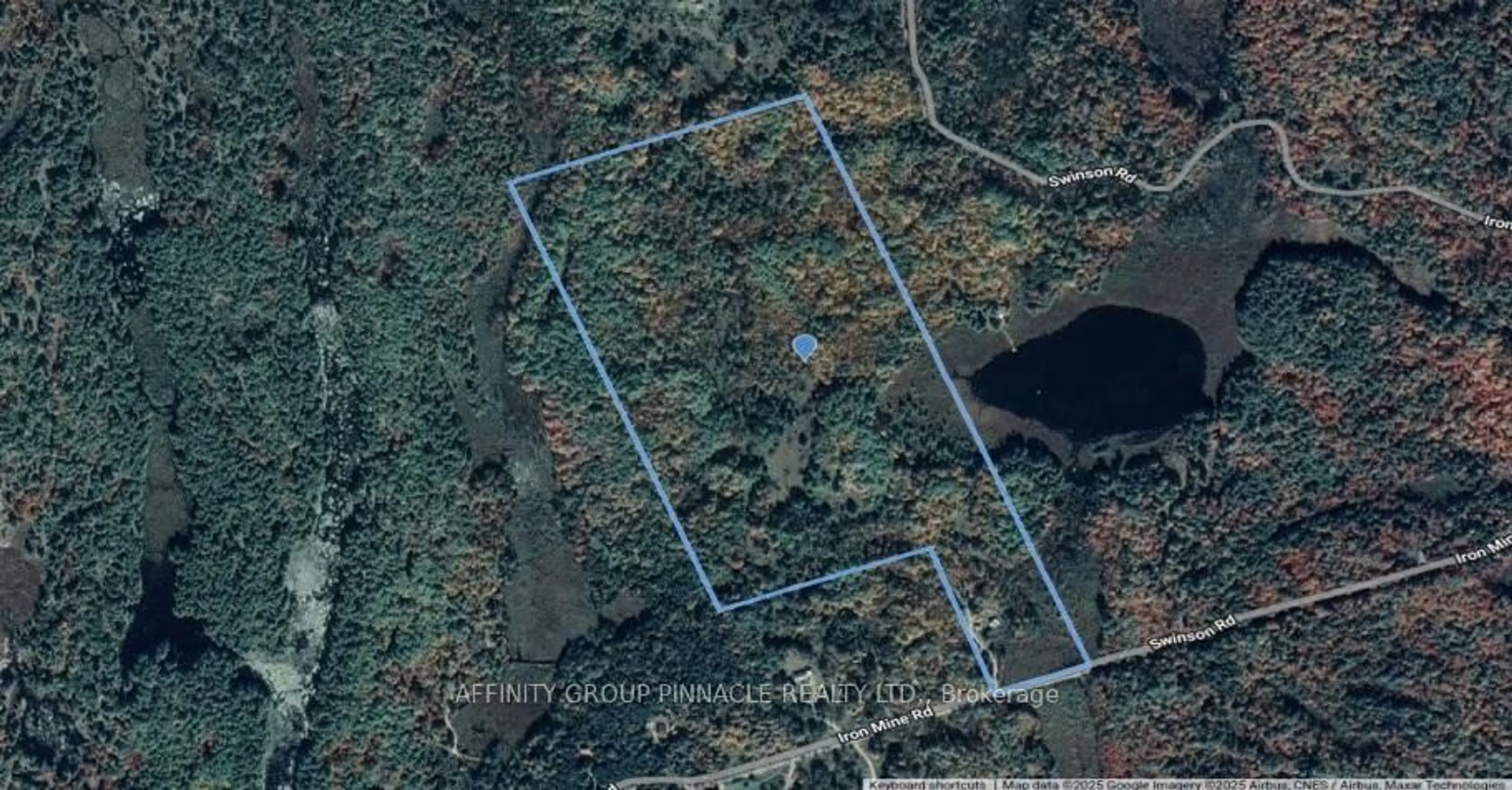A pic from outside/outdoor area/front of a property/back of a property/a pic from drone, water/lake/river/ocean view for 1197 Swinson Rd, Minden Hills Ontario K0M 2A1