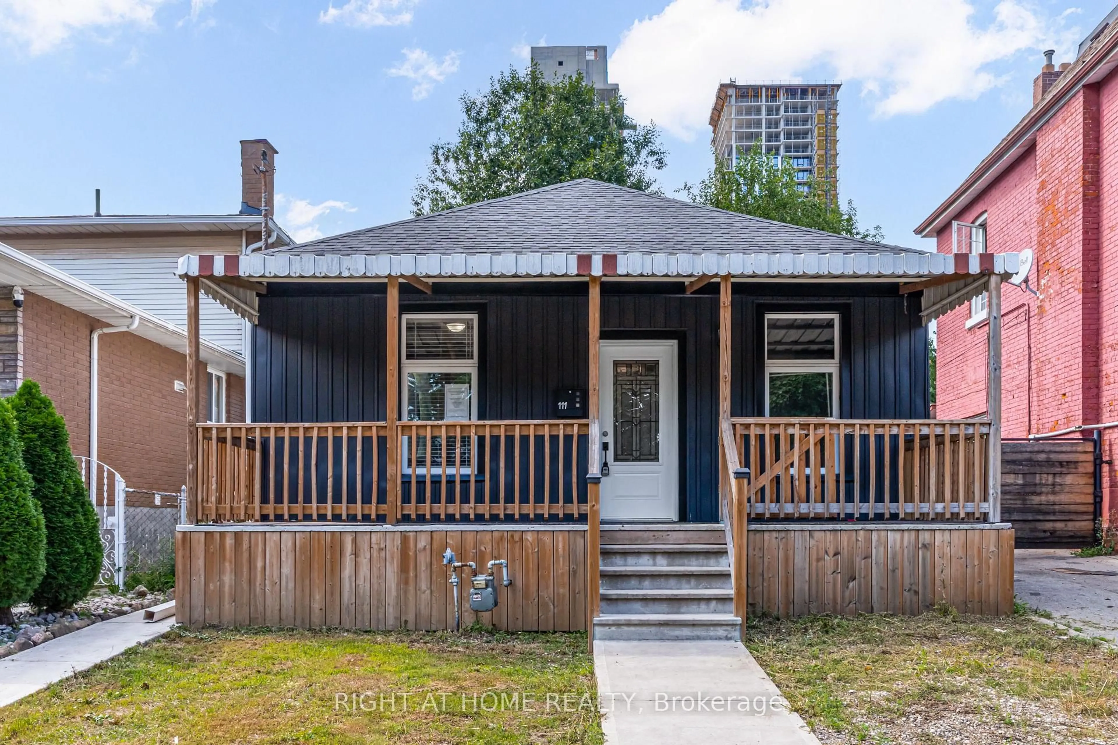 Home with vinyl exterior material, street for 111 Mary St, Hamilton Ontario L8R 1K4