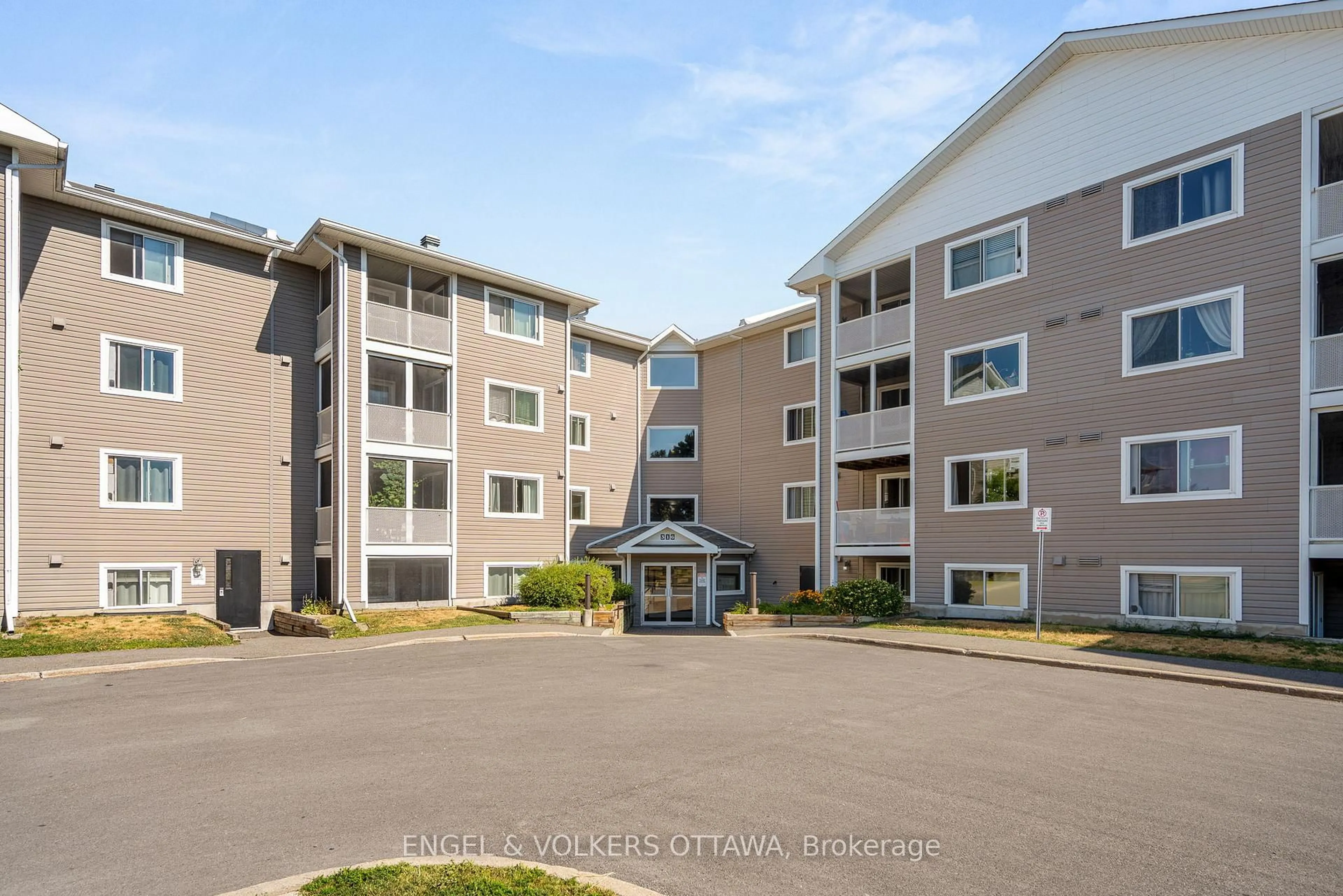 A pic from outside/outdoor area/front of a property/back of a property/a pic from drone, unknown for 316 Lorry Greenberg Dr #202, Ottawa Ontario K1T 2P4