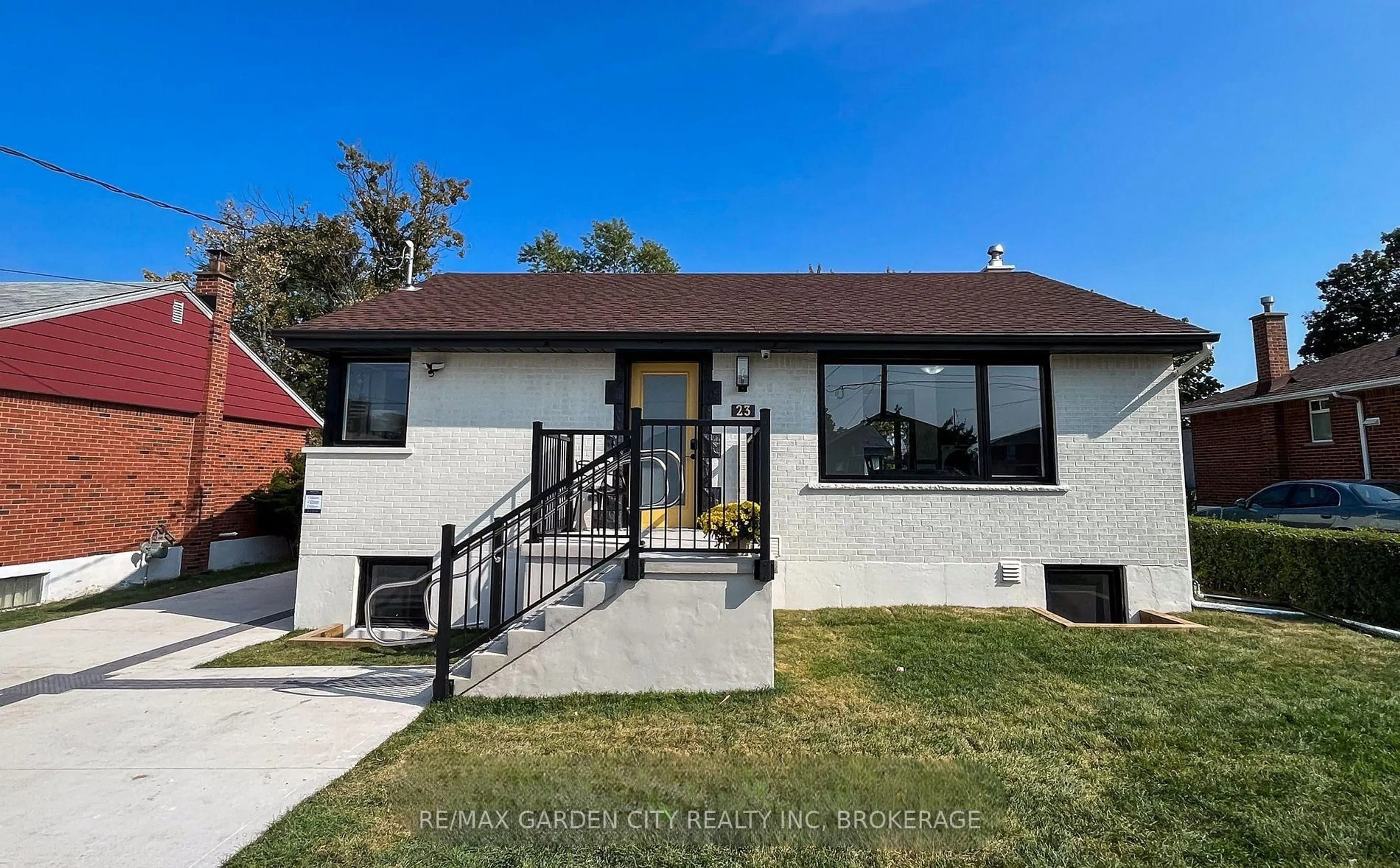 Home with vinyl exterior material, street for 23 Warren Ave, Hamilton Ontario L9A 3C7