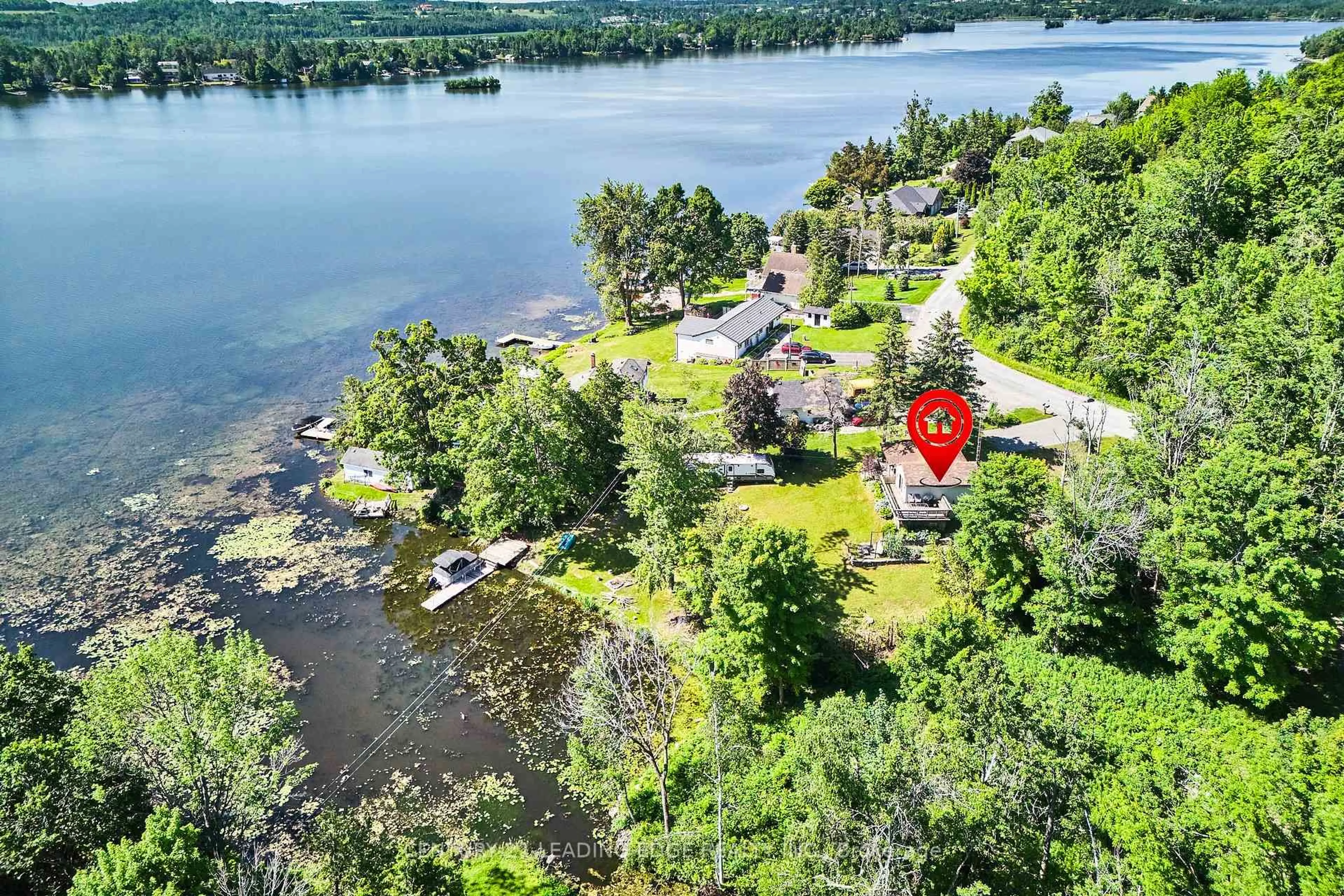A pic from outside/outdoor area/front of a property/back of a property/a pic from drone, water/lake/river/ocean view for 225 Arnott Dr, Selwyn Ontario K0L 1T0
