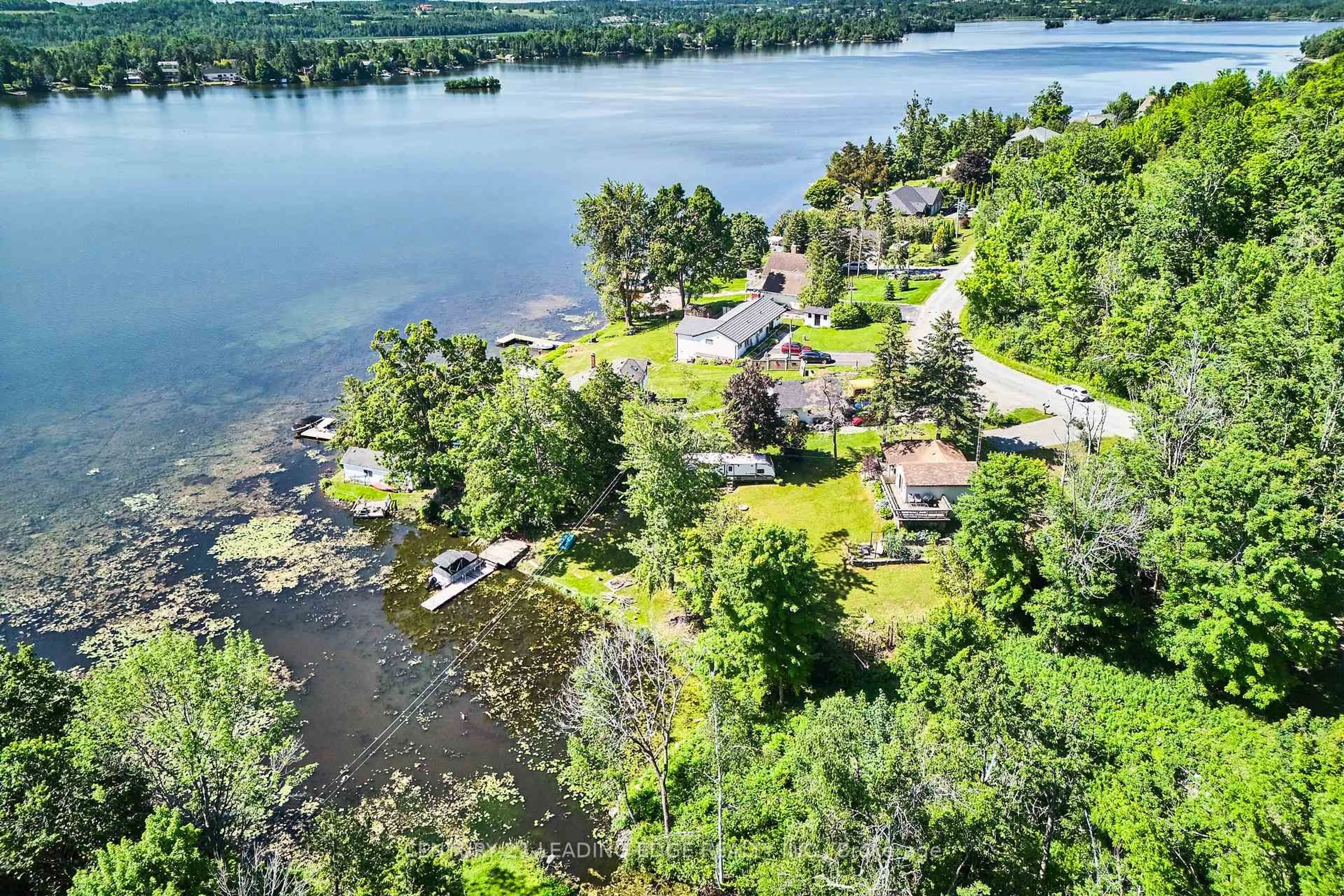 A pic from outside/outdoor area/front of a property/back of a property/a pic from drone, water/lake/river/ocean view for 225 Arnott Dr, Selwyn Ontario K0L 1T0