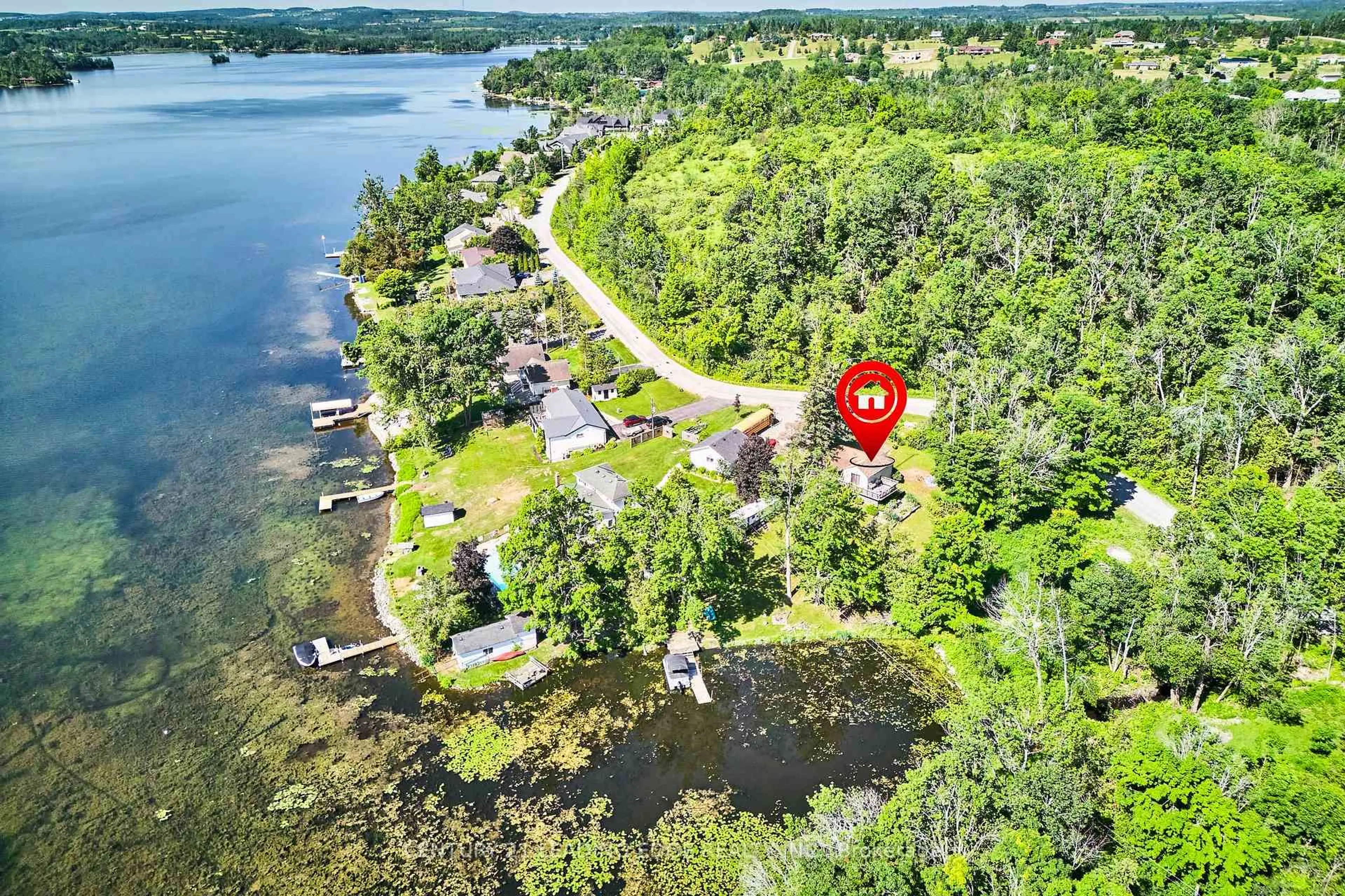 A pic from outside/outdoor area/front of a property/back of a property/a pic from drone, water/lake/river/ocean view for 225 Arnott Dr, Selwyn Ontario K0L 1T0