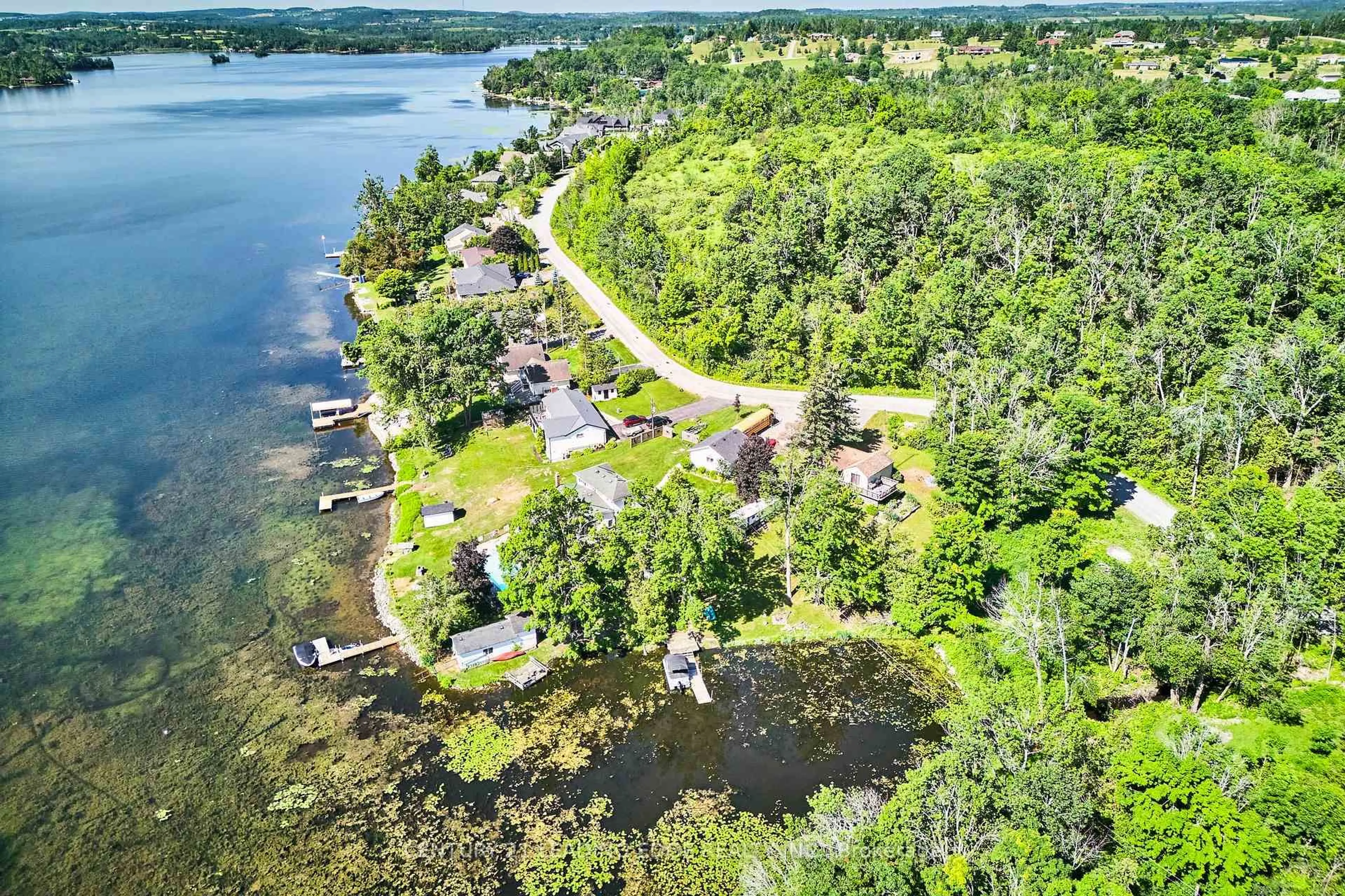A pic from outside/outdoor area/front of a property/back of a property/a pic from drone, water/lake/river/ocean view for 225 Arnott Dr, Selwyn Ontario K0L 1T0