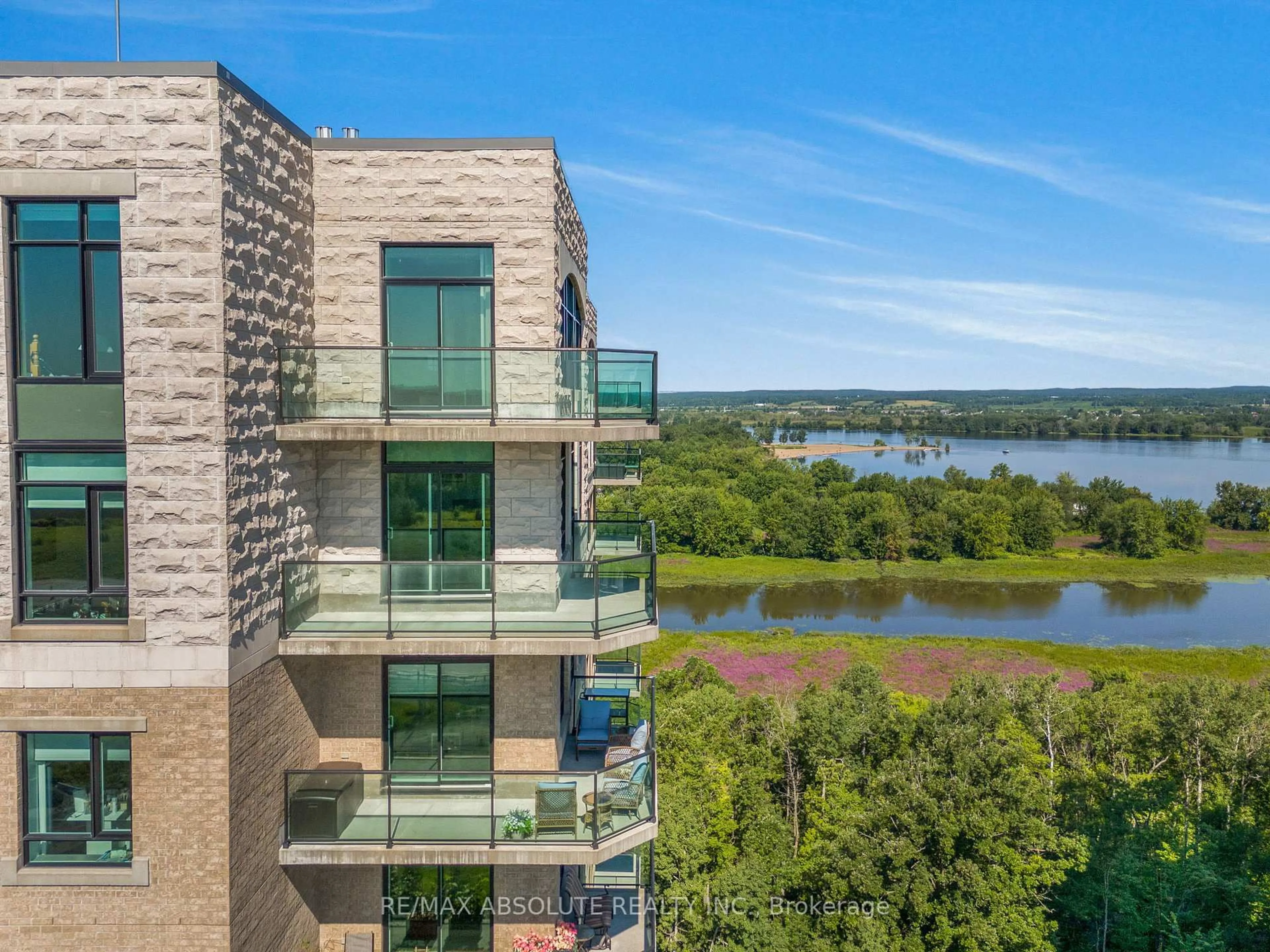 A pic from outside/outdoor area/front of a property/back of a property/a pic from drone, water/lake/river/ocean view for 100 Inlet Private #1505, Ottawa Ontario K4A 0S8