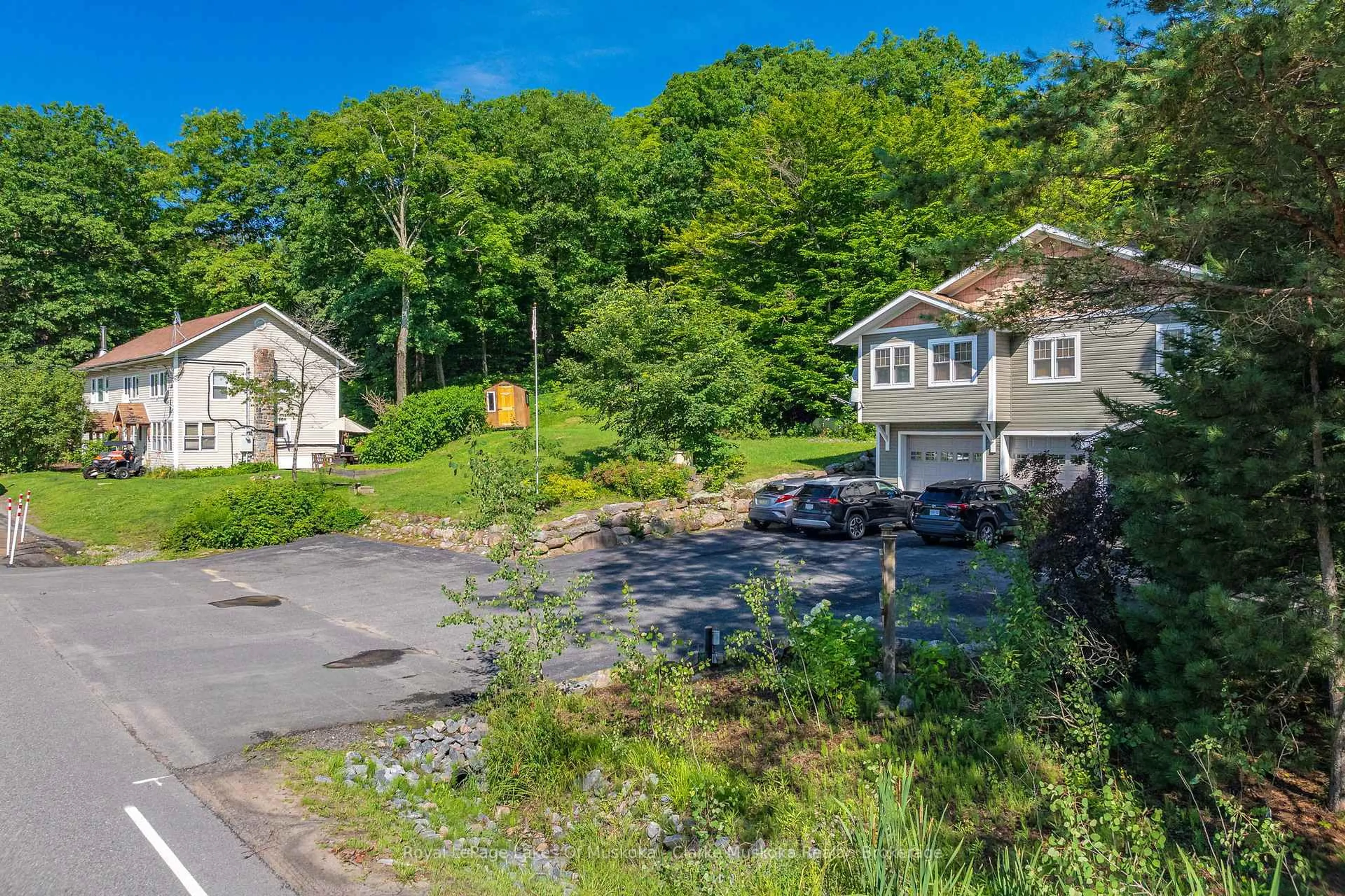 A pic from outside/outdoor area/front of a property/back of a property/a pic from drone, street for 1013 JUDDHAVEN Rd, Muskoka Lakes Ontario P0B 1G0