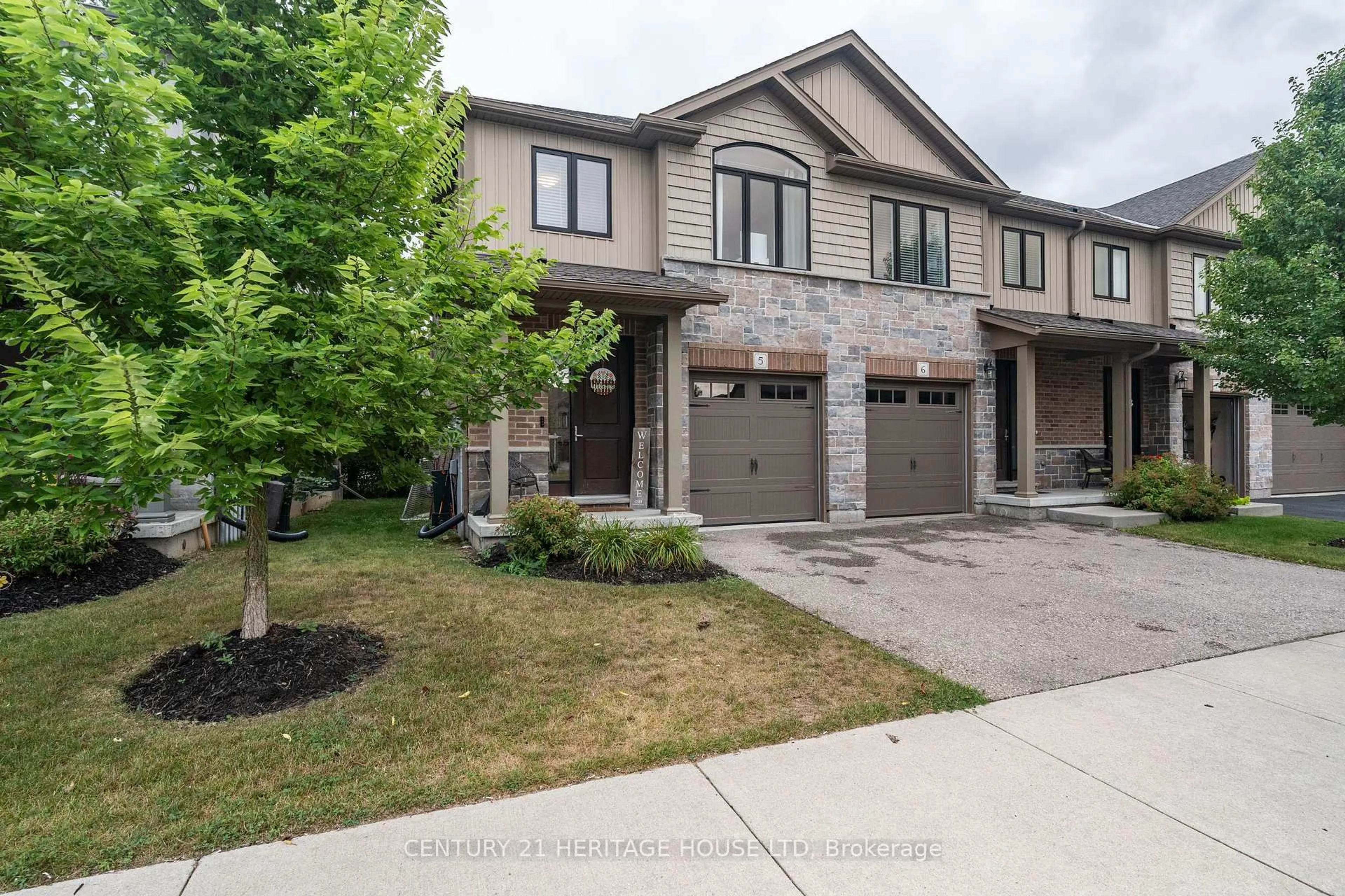 Home with brick exterior material, street for 50 Bute St #5, North Dumfries Ontario N0B 1E0