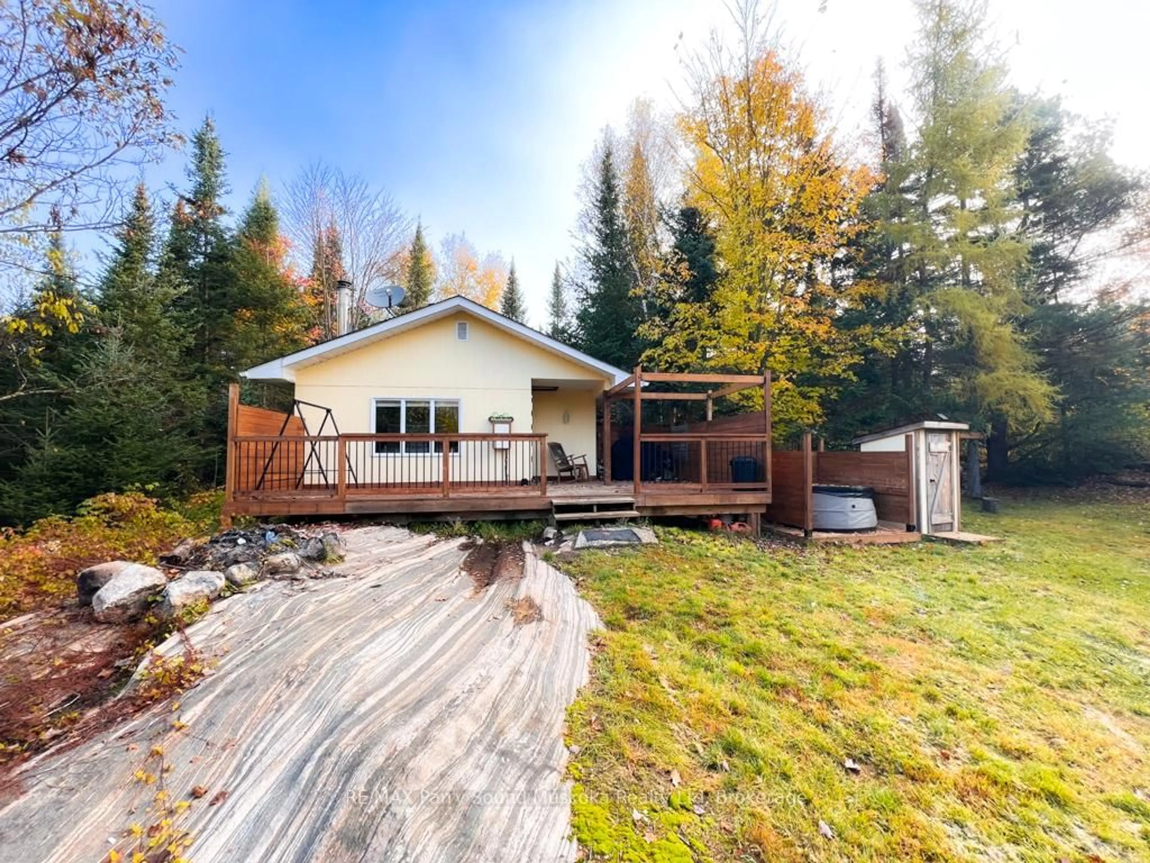 A pic from outside/outdoor area/front of a property/back of a property/a pic from drone, forest/trees view for 17 Ainslie Lake Rd, Whitestone Ontario P0A 1G0