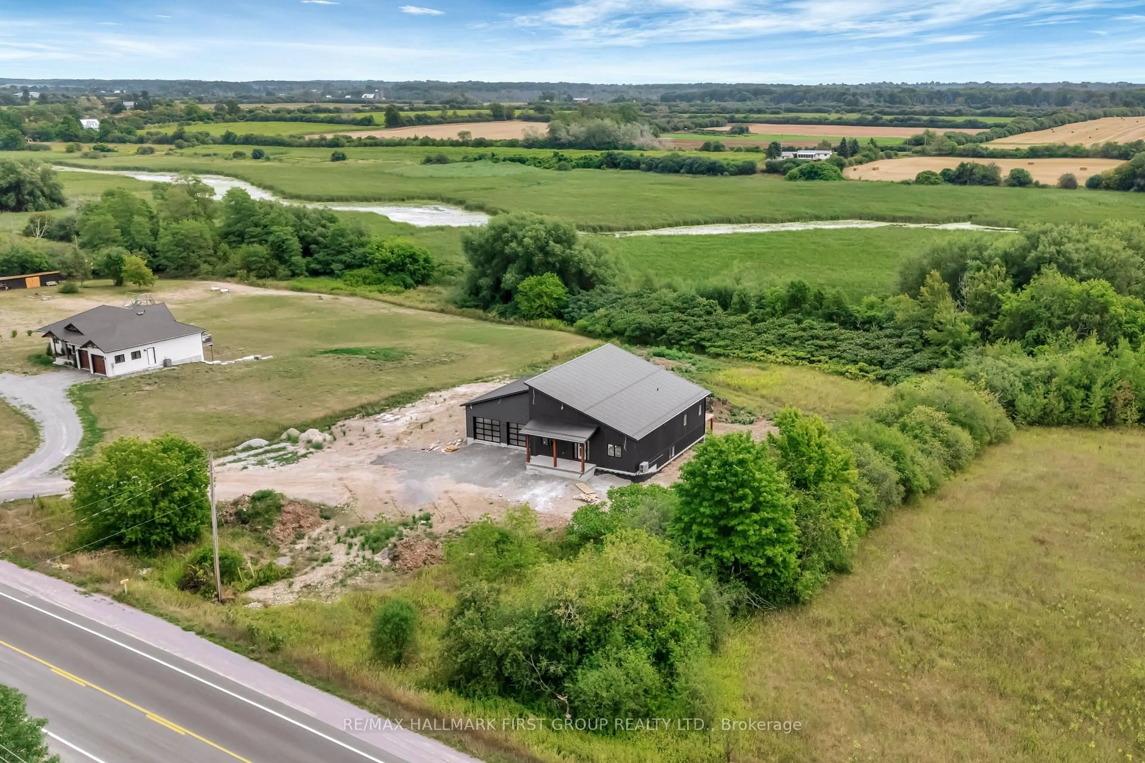 A pic from outside/outdoor area/front of a property/back of a property/a pic from drone, building for 19115 Loyalist Pkwy, Prince Edward County Ontario K0K 1T0
