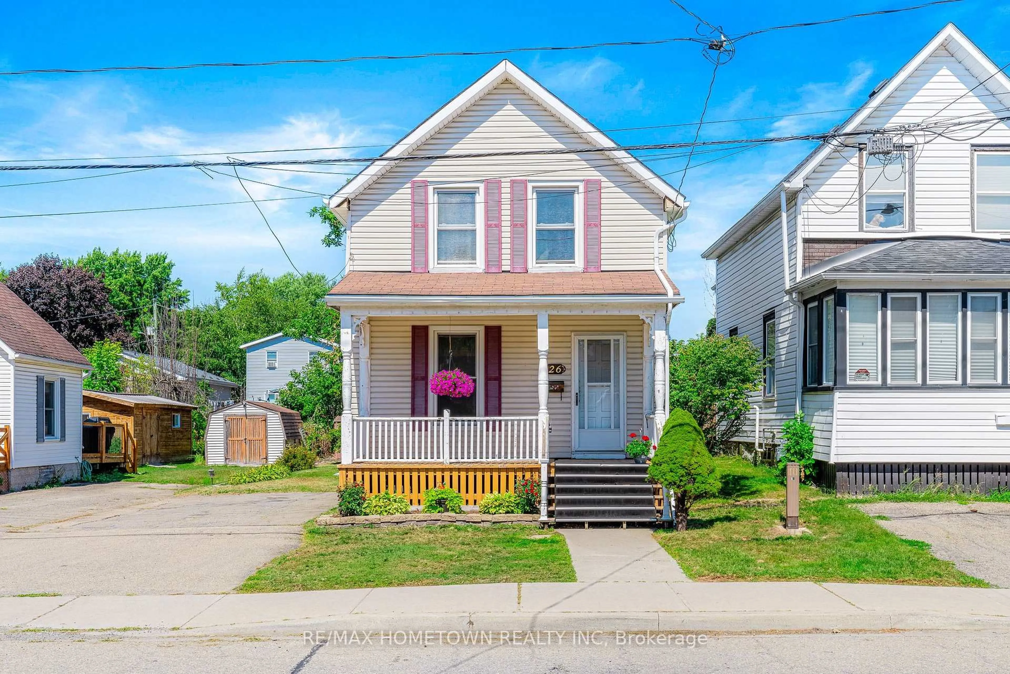 Home with vinyl exterior material, street for 26 Front Ave, Brockville Ontario K6V 1V6