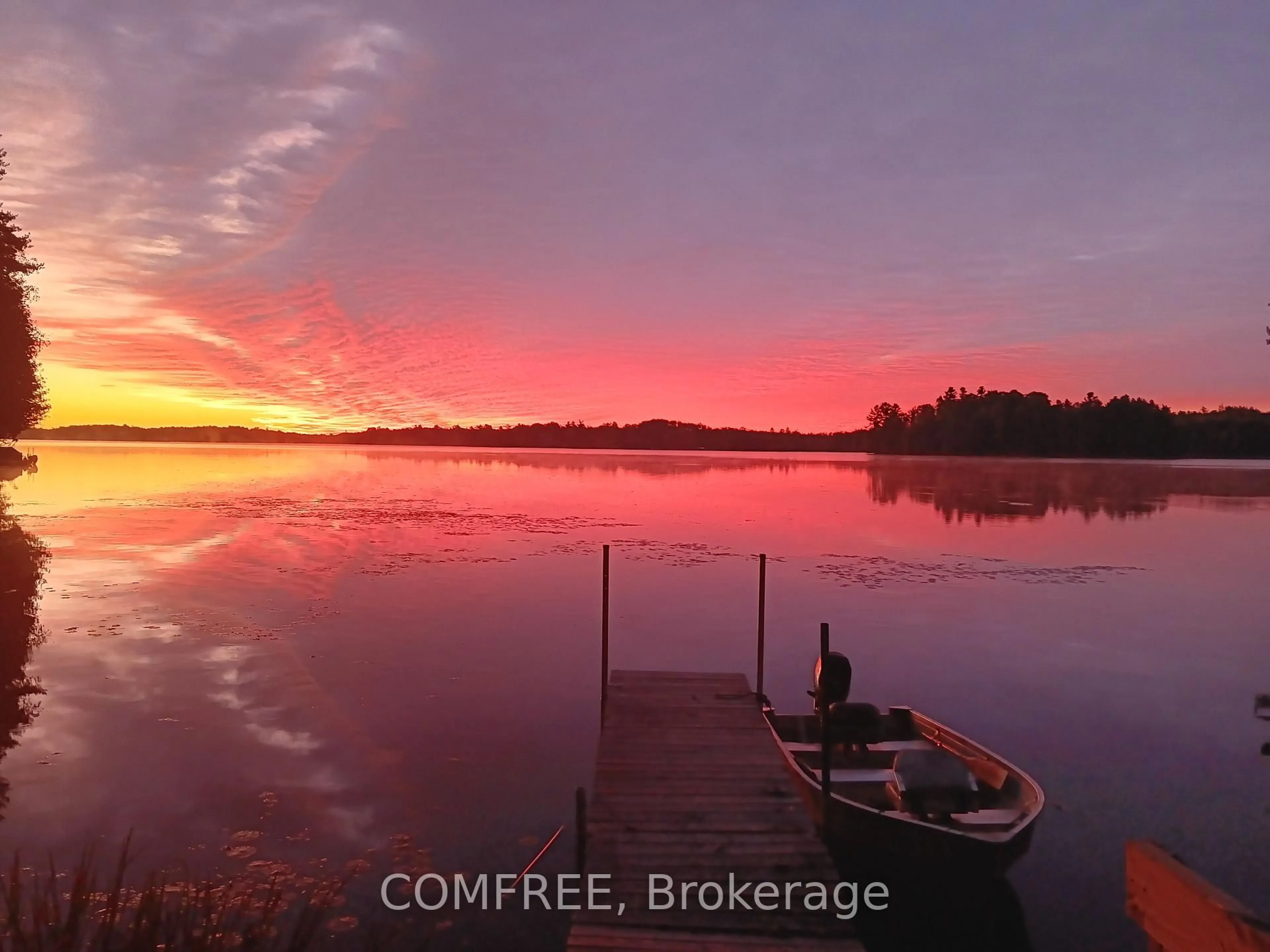 A pic from outside/outdoor area/front of a property/back of a property/a pic from drone, water/lake/river/ocean view for 1005 Hoyle Lane, Maberly Ontario K0H 2B0