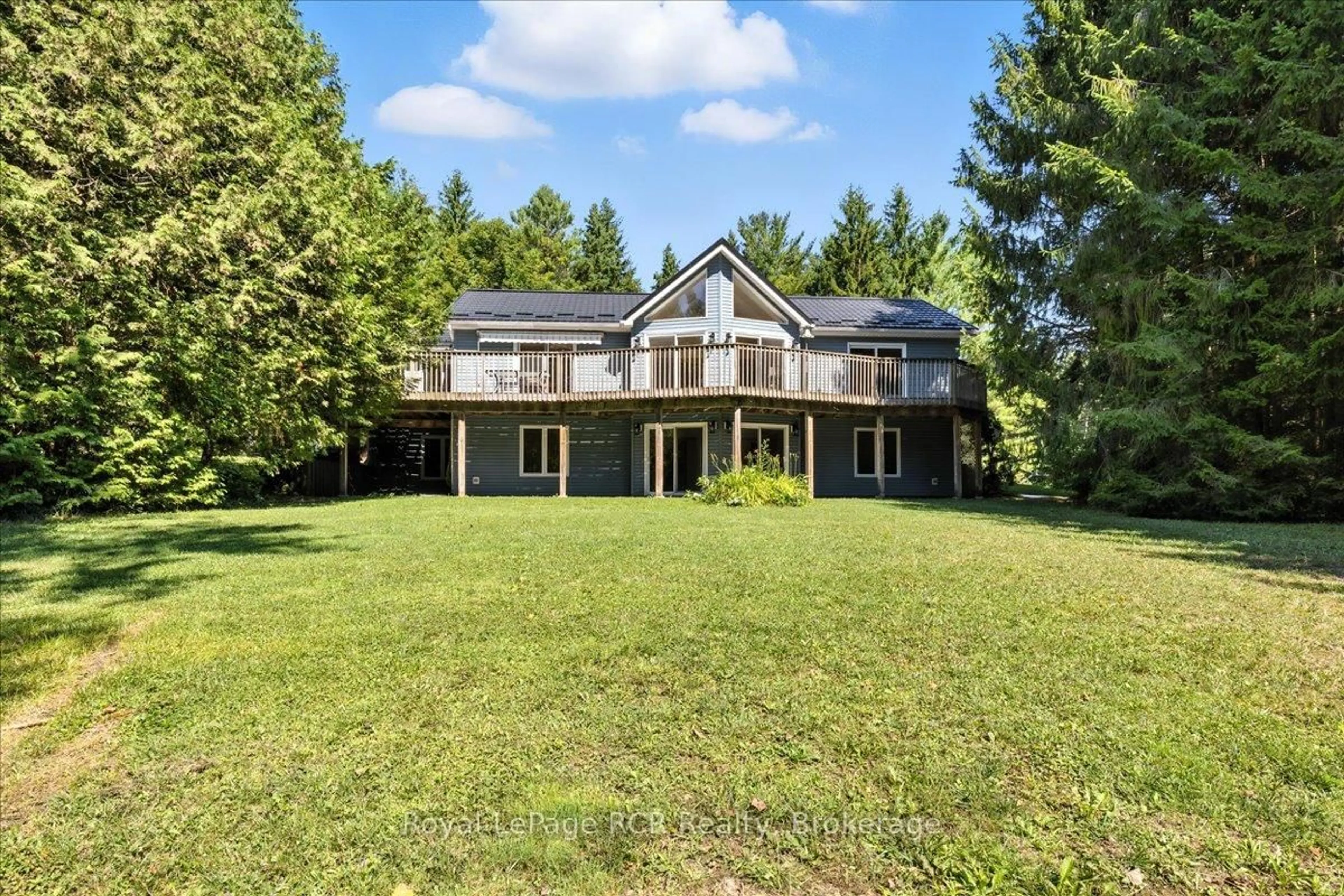 A pic from outside/outdoor area/front of a property/back of a property/a pic from drone, water/lake/river/ocean view for 102703 Road 49, West Grey Ontario N0G 2L0
